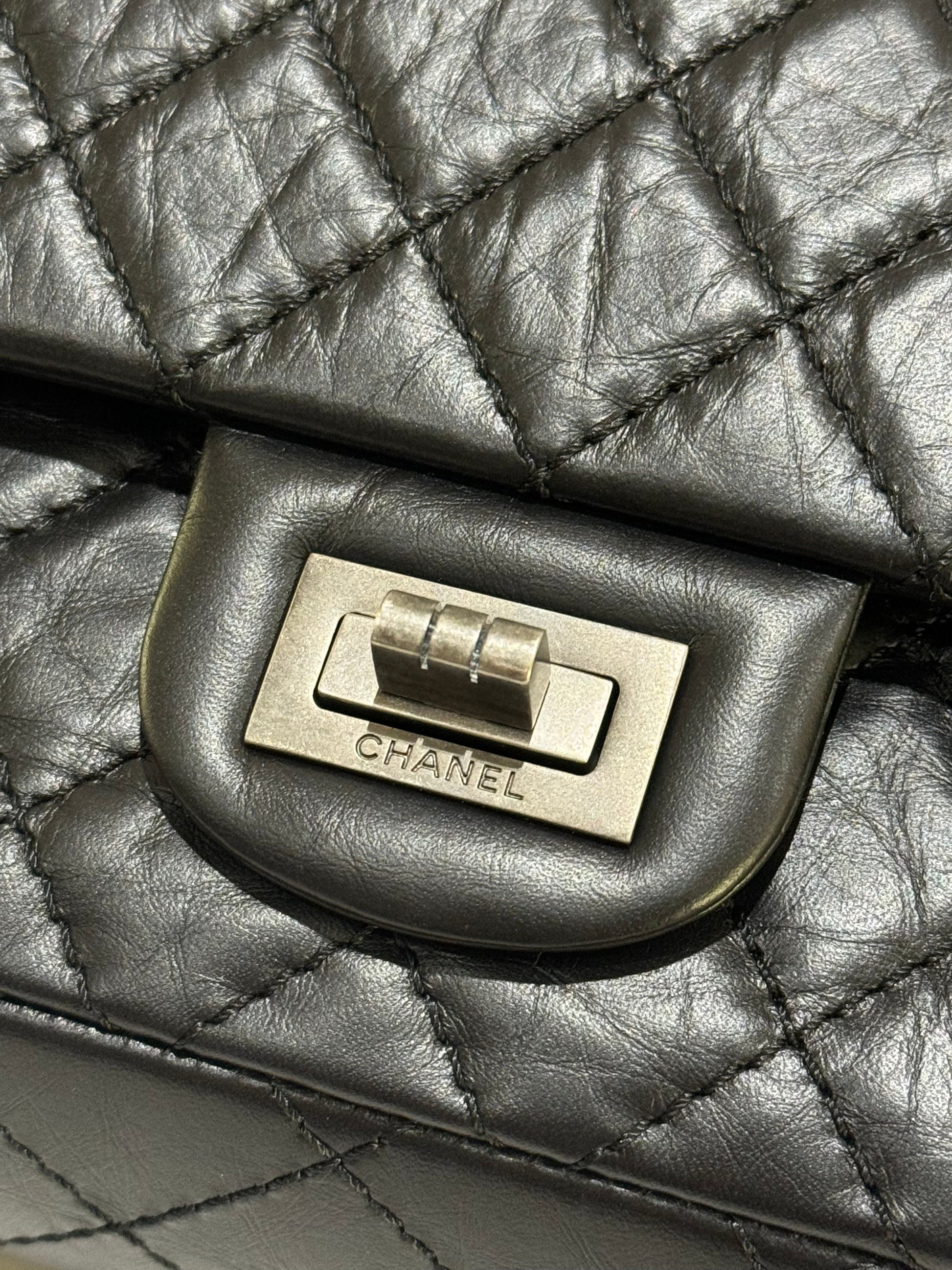 CHANEL 2.55 BLACK WITH SILVER HARDWARE AND CHIP