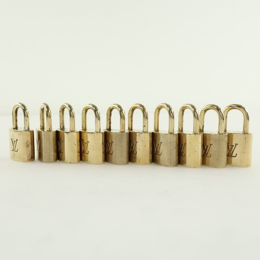 Louis Vuitton Cadena brass 10 pieces set Gold Handbag