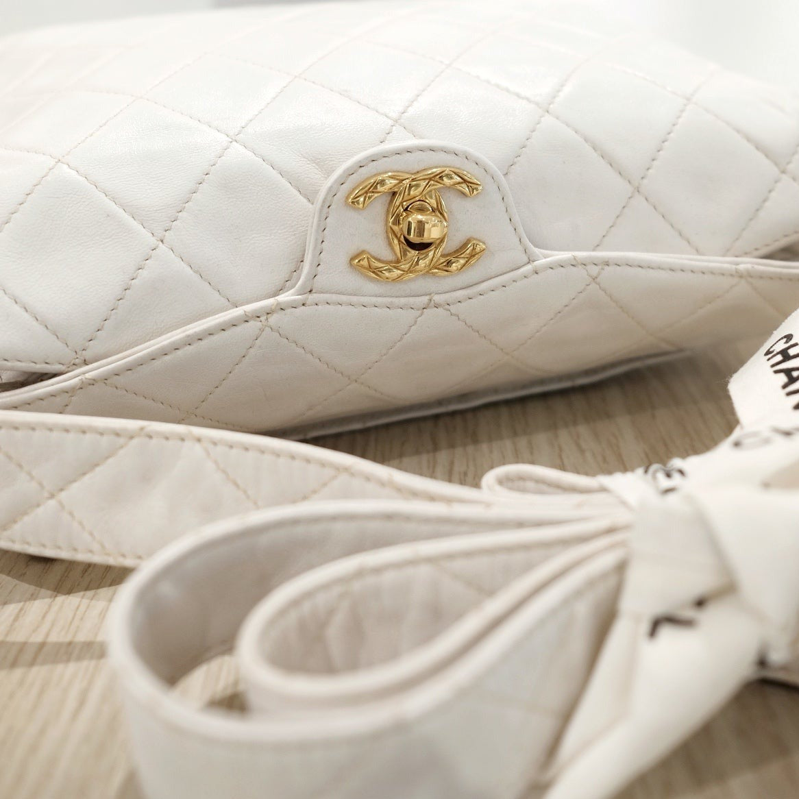 Chanel   diamond logo post bag
