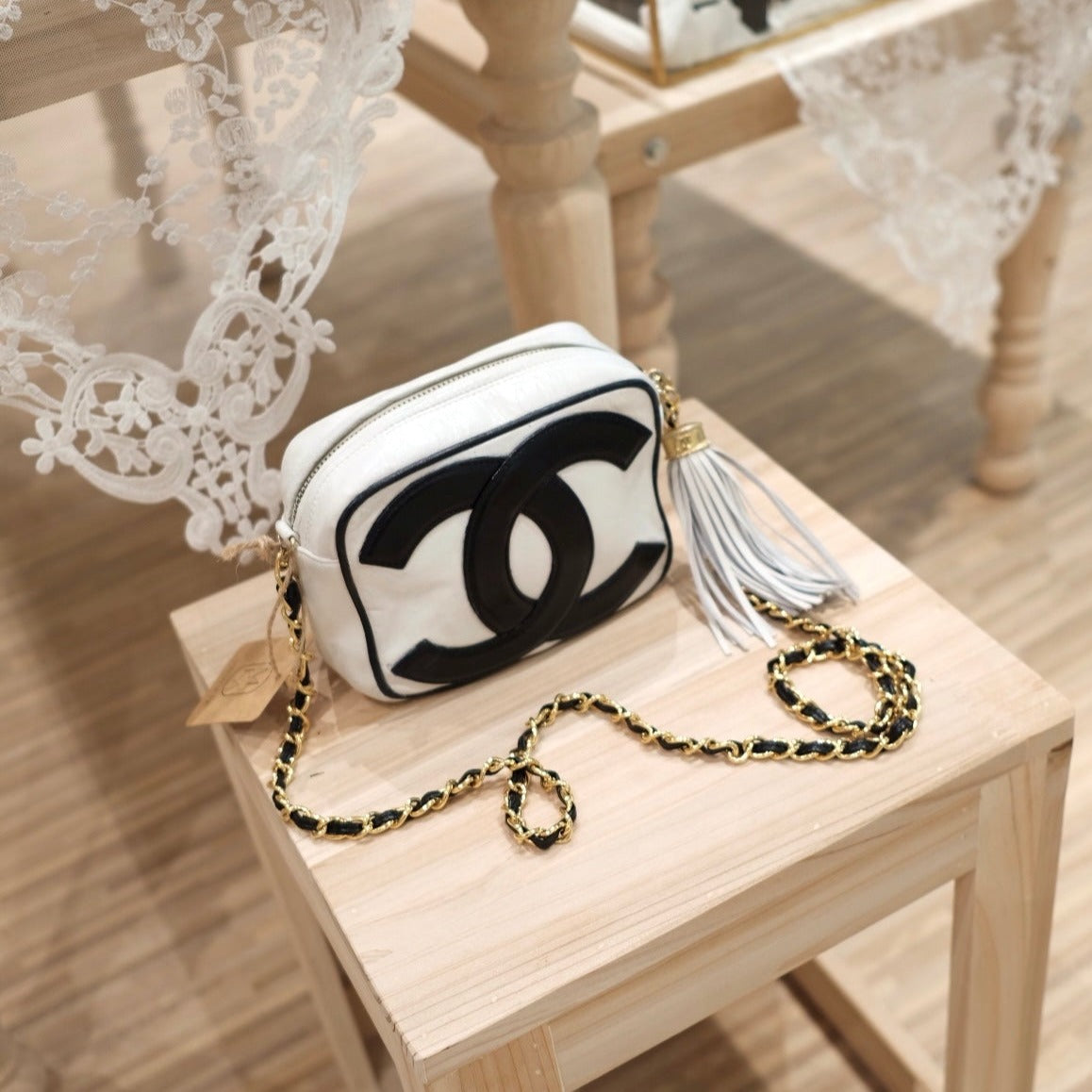 Chanel   CC camera crossbody bag with tassel
