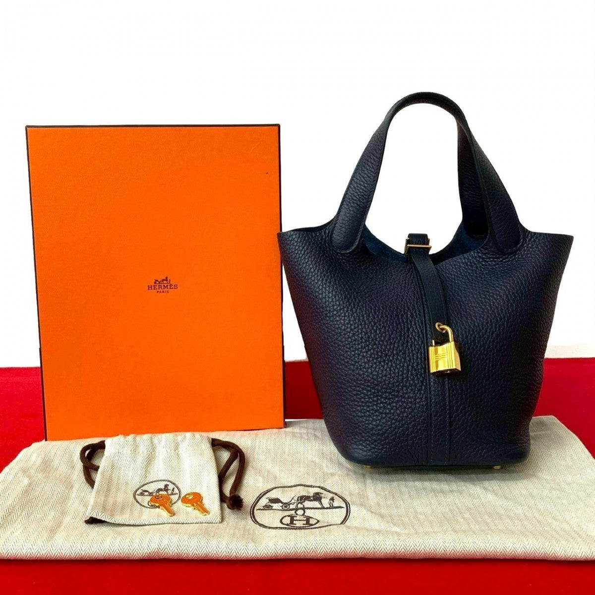 Taurillon Clemence Navy Picotan Lock Pm Travel Bag