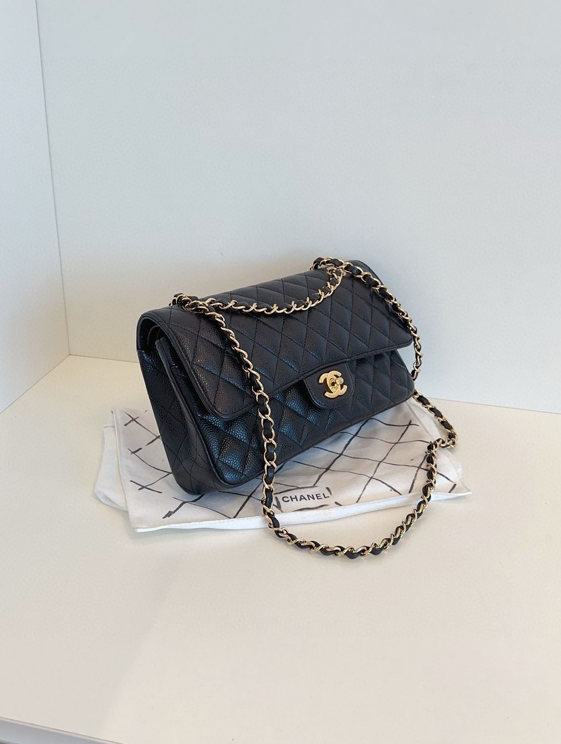 Chanel classic flap CF medium black caviar leather bag year