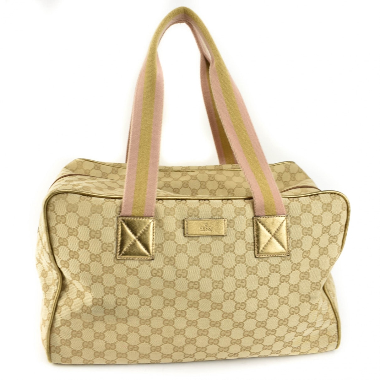 Gucci gold cloth travel bag