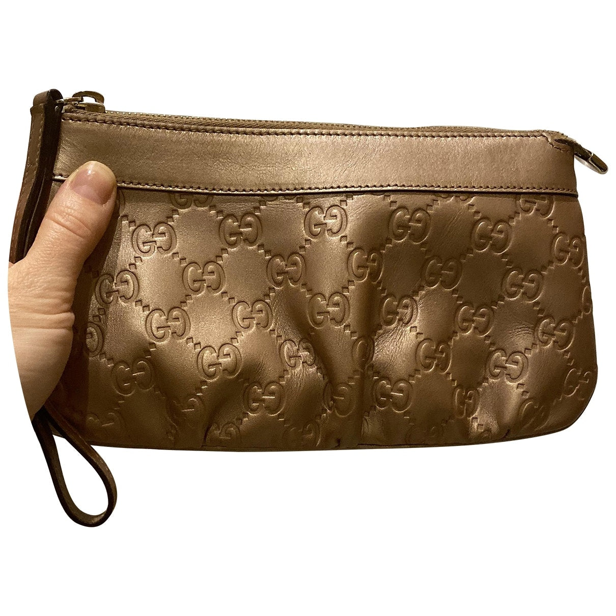 Gucci gold leather clutch bag