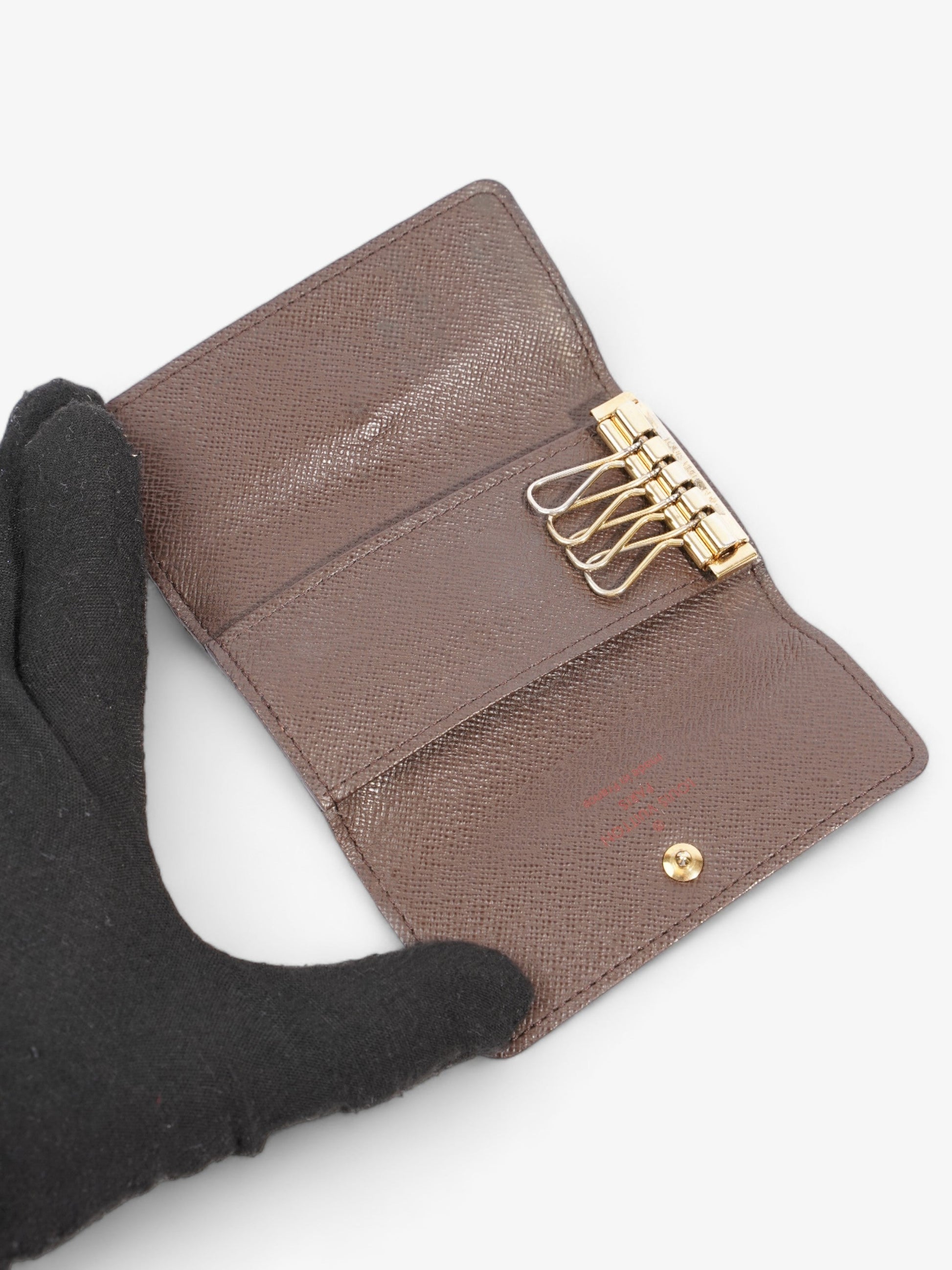 Louis Vuitton 4 Holder Ebene Coated Damier Canvas Coated Canvas Apparel