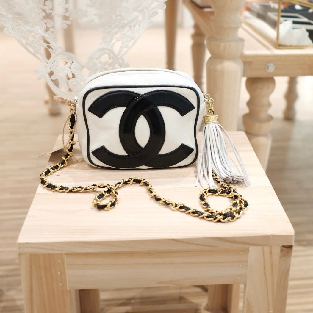 Chanel   CC camera crossbody bag with tassel