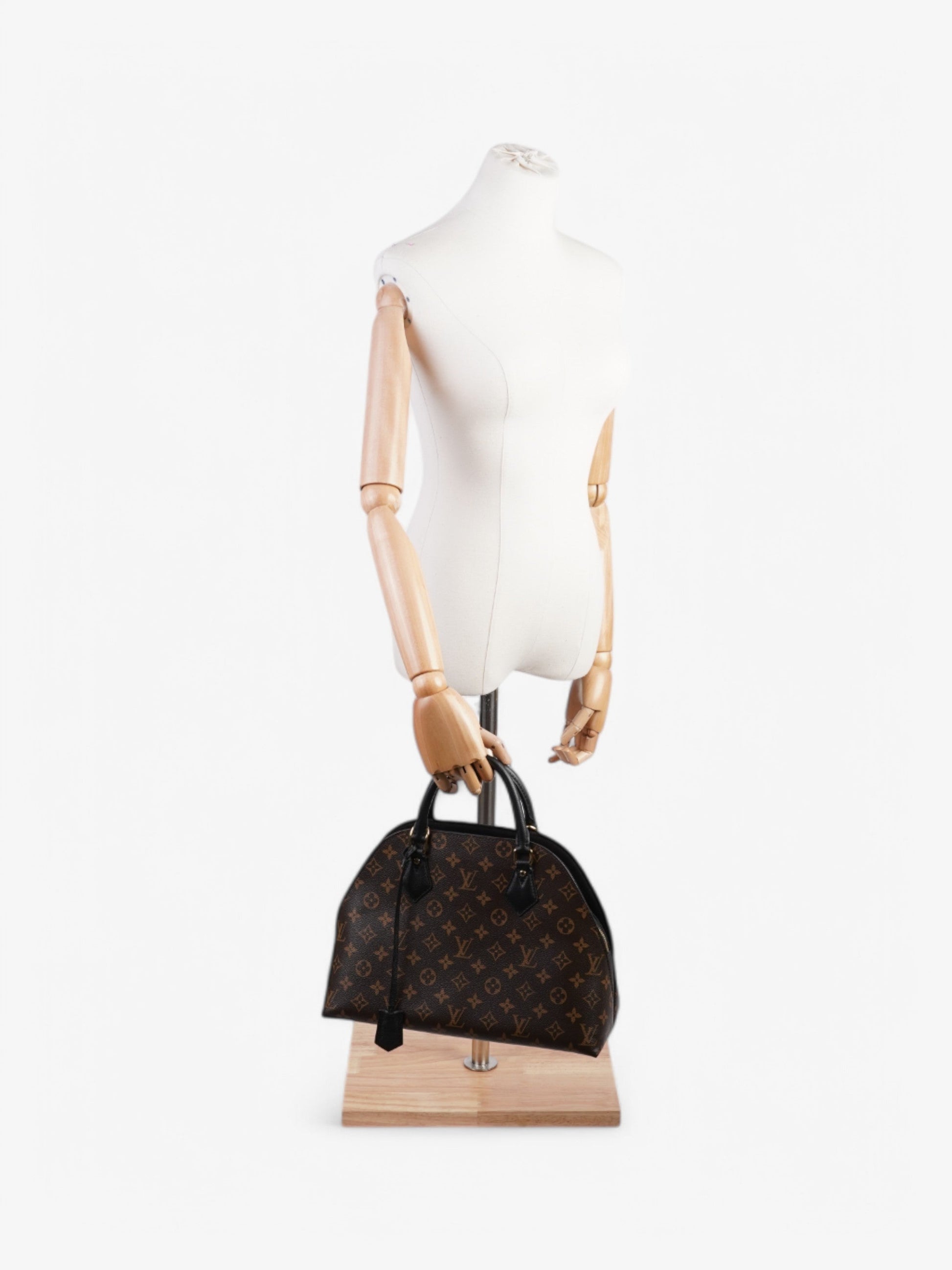 Louis Vuitton Alma Macassar 2 Way Coated Monogram Canvas Coated Canvas Black Apparel
