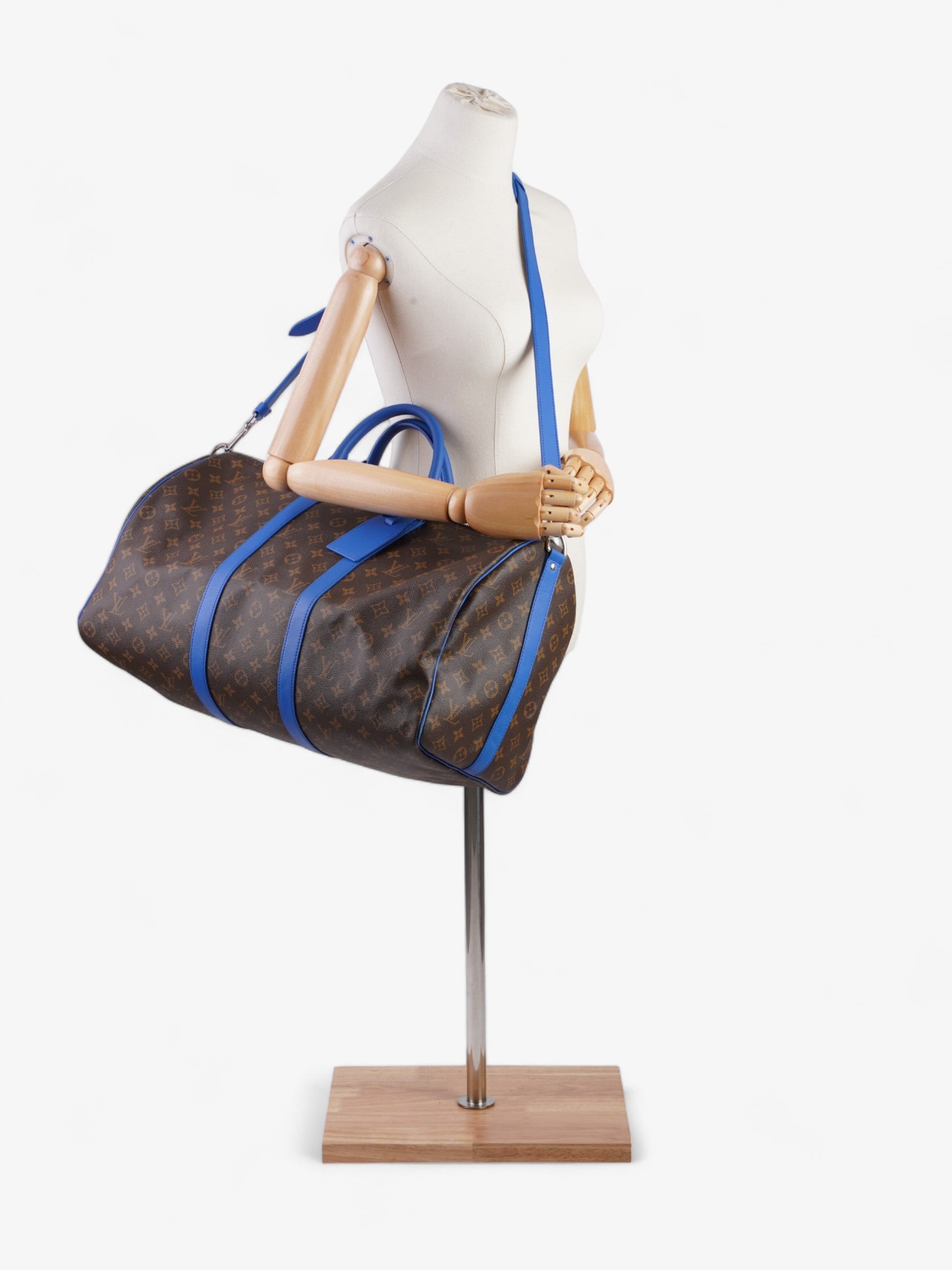 Louis Vuitton Keepall Bandoulière 50 Coated Monogram Canvas Coated Canvas Blue Apparel