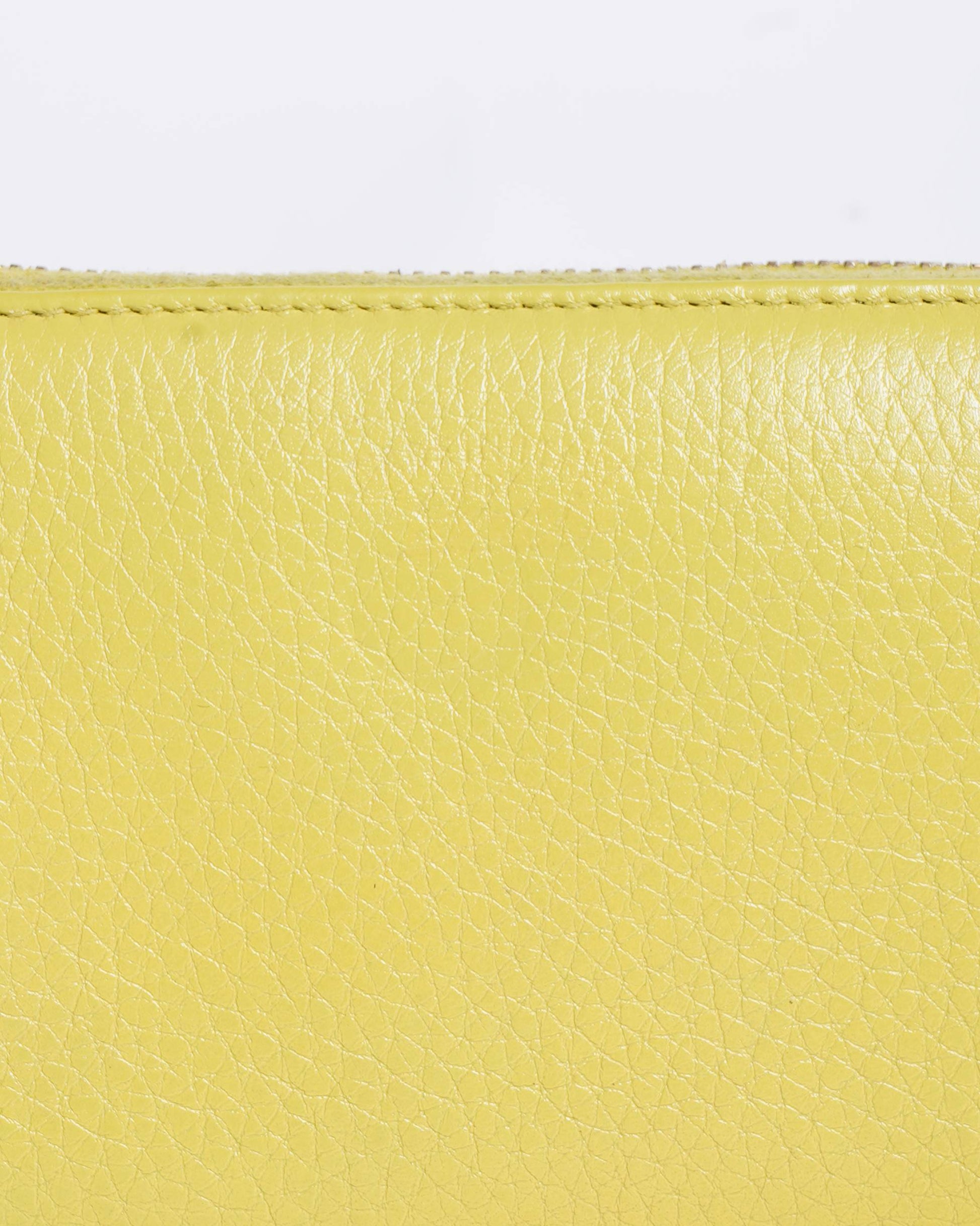 Gucci Leather Zippy Wallet in Yellow