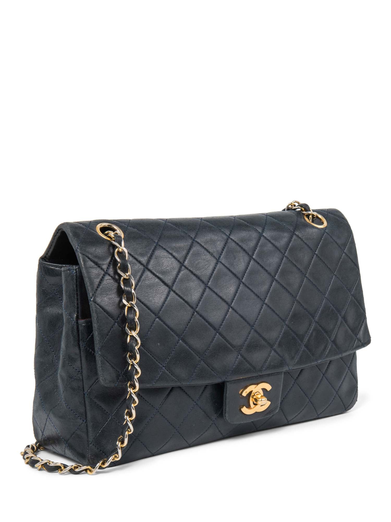 Chanel . Quilted K Gold Plated Medium Flap Bag Navy Blue