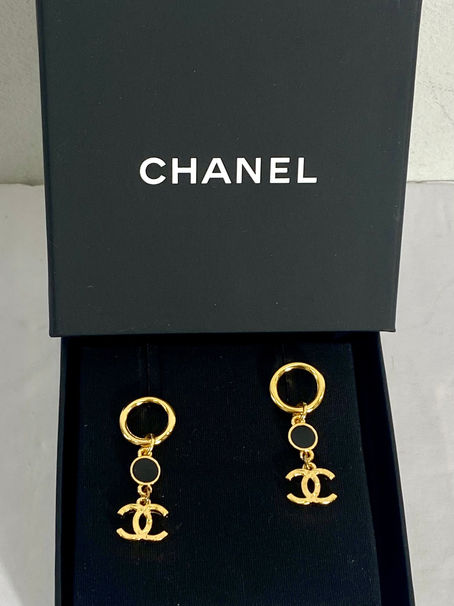 CHANEL GOLD TONE BLACK ENAMEL DANGLE EARRINGS