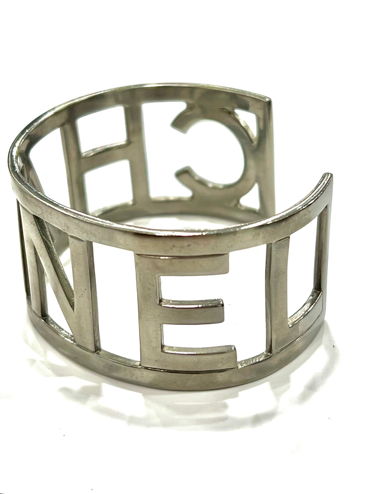 CHANEL METAL LOGO CUFF BRACELET
