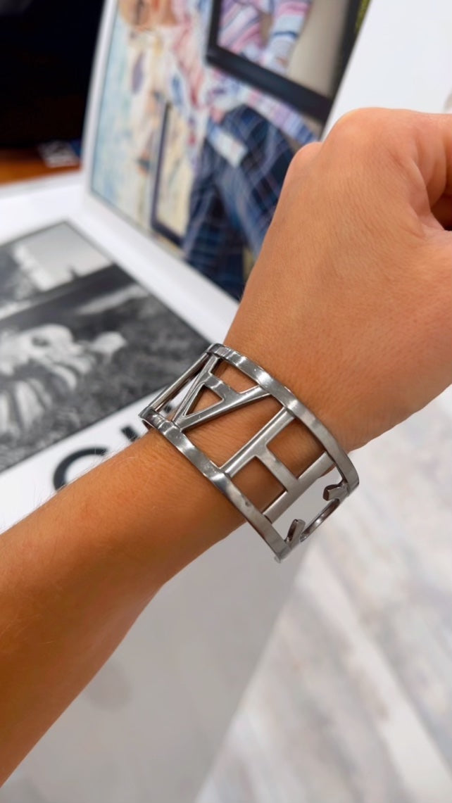CHANEL METAL LOGO CUFF BRACELET