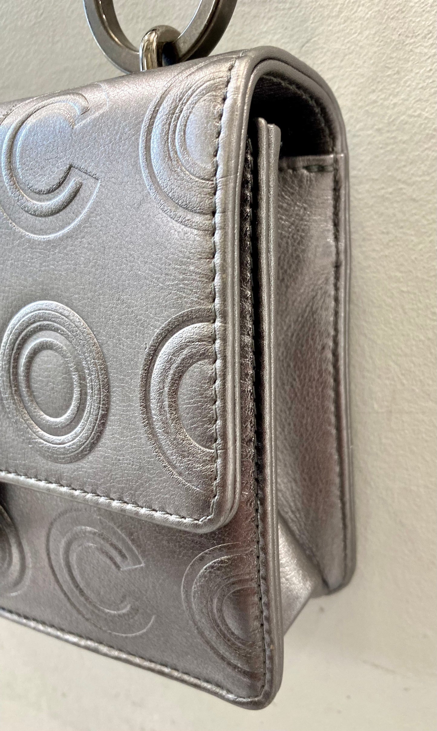 Chanel Silver Metallic Calfskin Coco Embossed Bag
