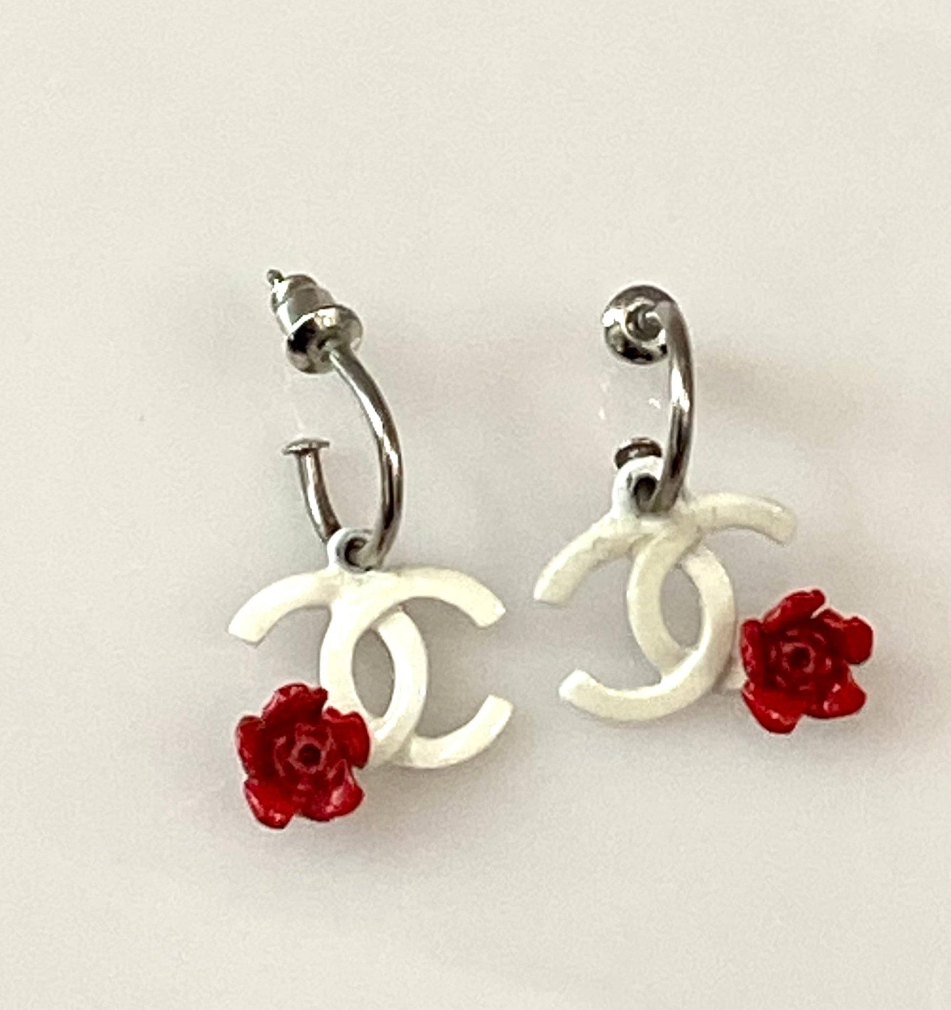CHANEL SILVER PLATED DANGLE PIERCED EARRINGS