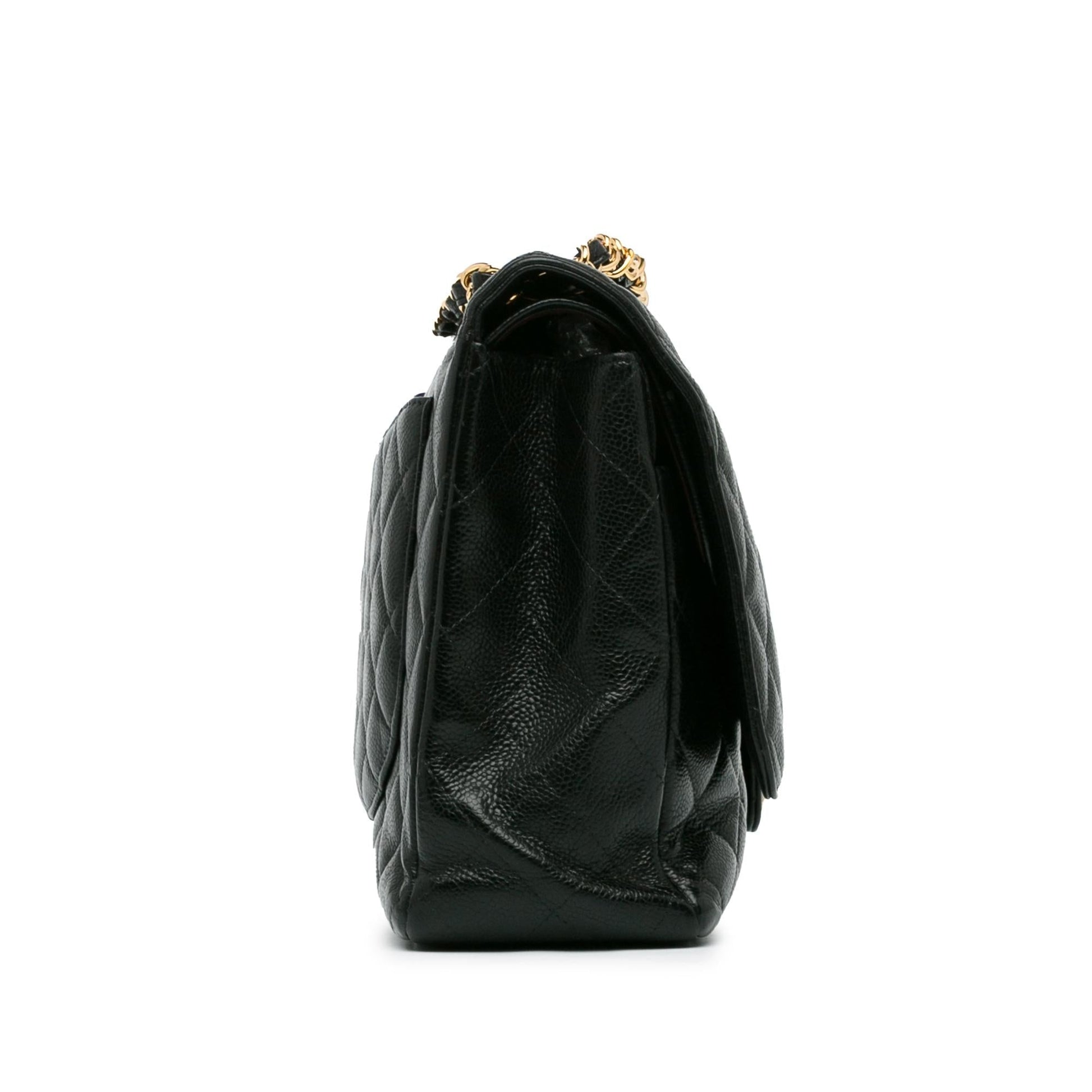 Chanel Maxi Classic Caviar Double Flap (Shg-Nah1Rf) Bag