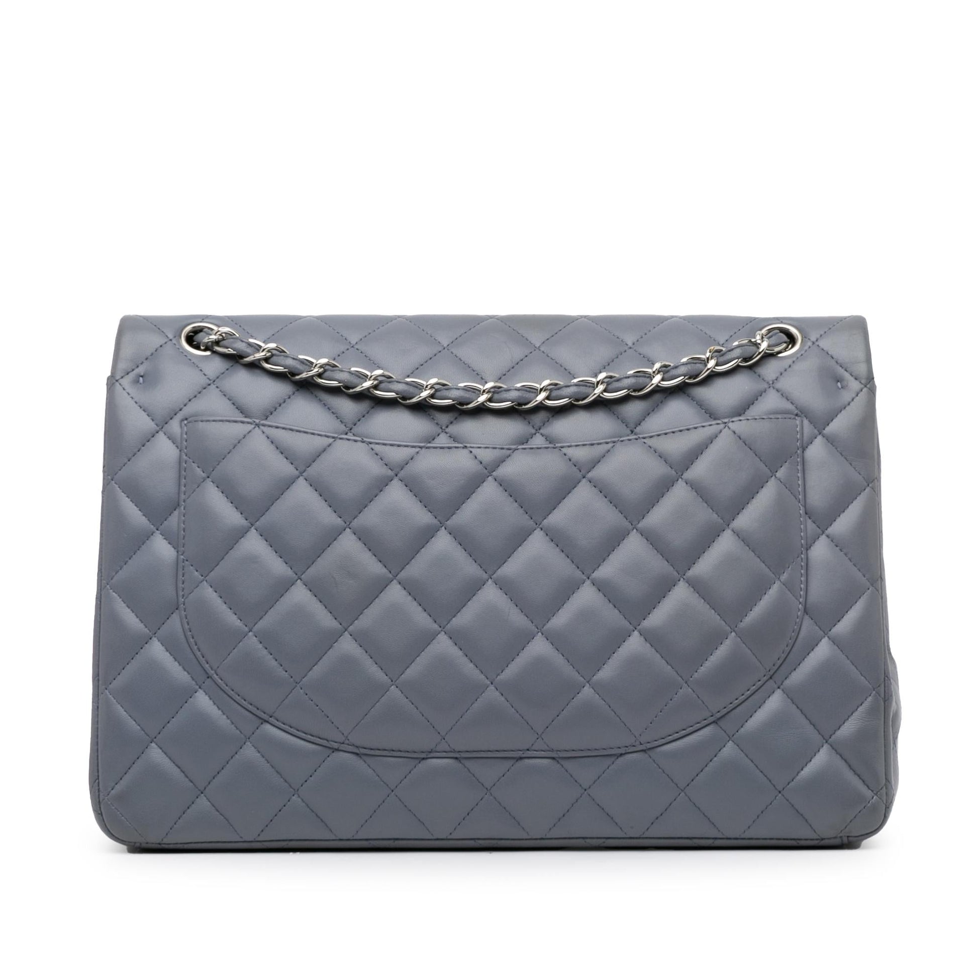 Chanel Maxi Classic Lambskin Double Flap (Shg-T5W6E8) Bag