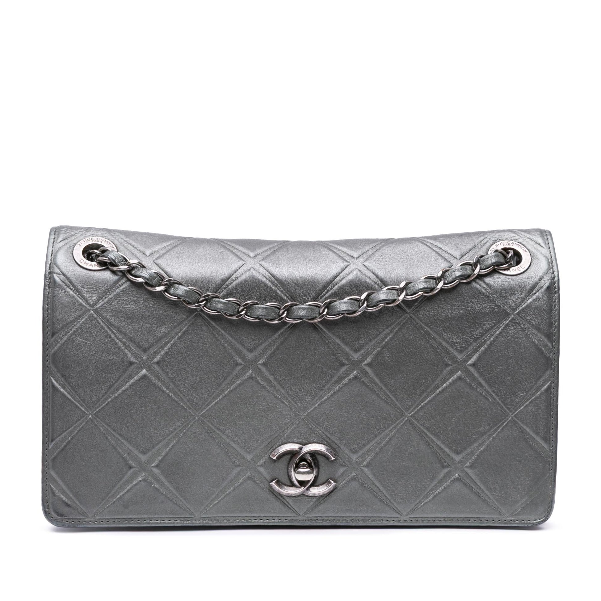 Chanel Embossed Calfskin Propeller Flap Handbag