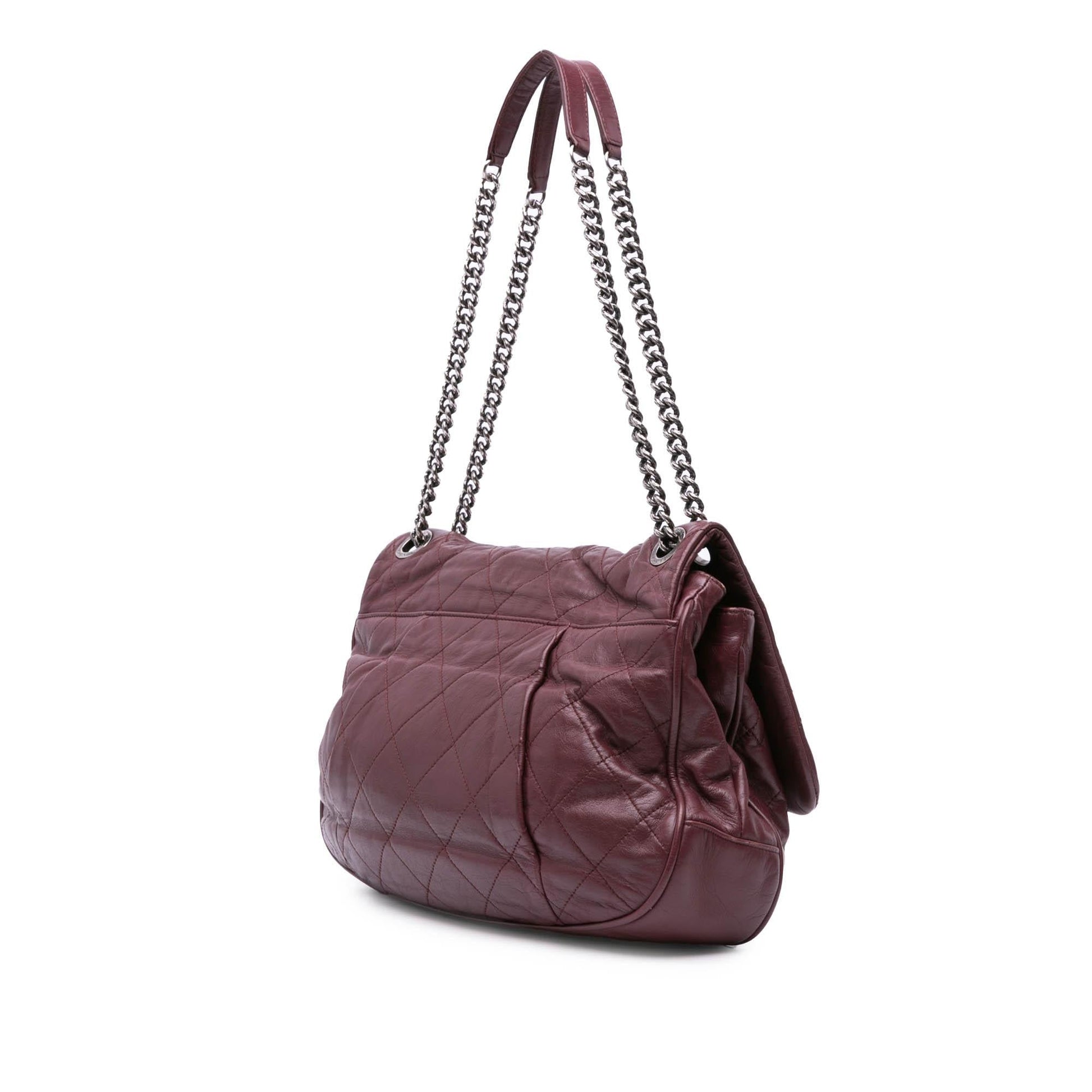 Chanel Quilted Calfskin Coco Pleats Flap Handbag
