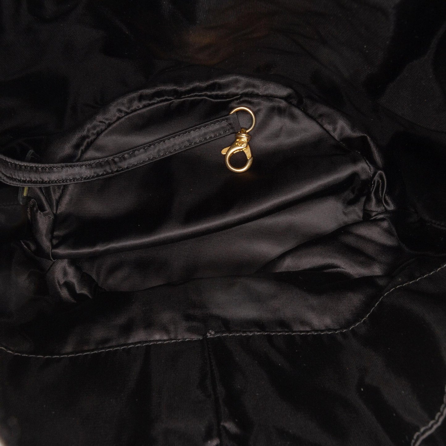 Chanel Quilted Nylon Crystal CC Drawstring Sling Bag 228824 Right Angle 0 Parent