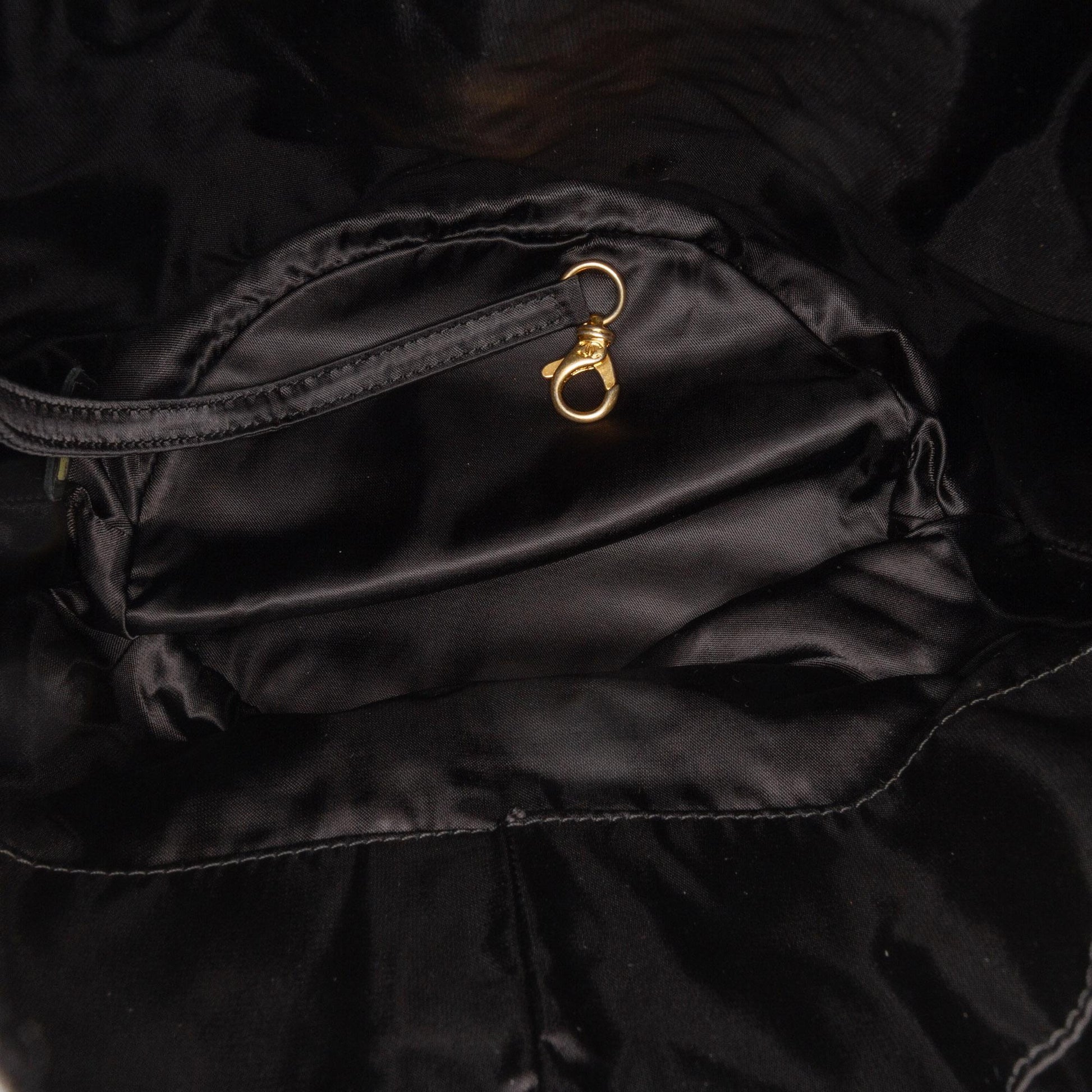 Chanel Quilted Nylon Crystal CC Drawstring Sling Bag 228824 Right Angle 0 Parent