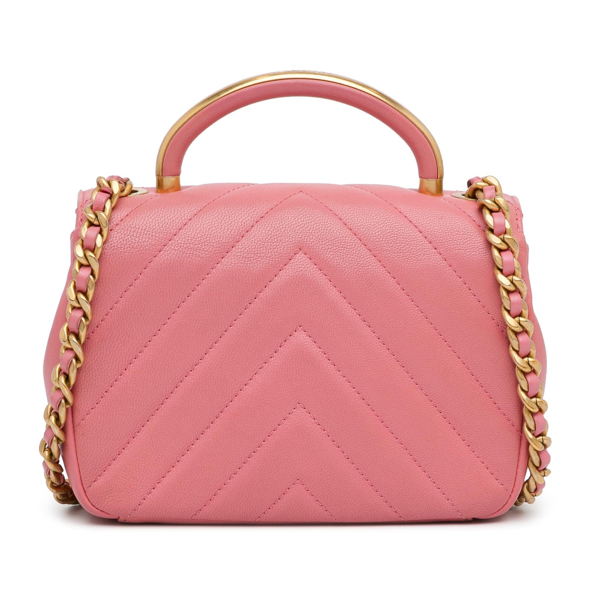 Chanel Small Chevron Lambskin Reversed Round Flap (Shg-Tika51) Bag