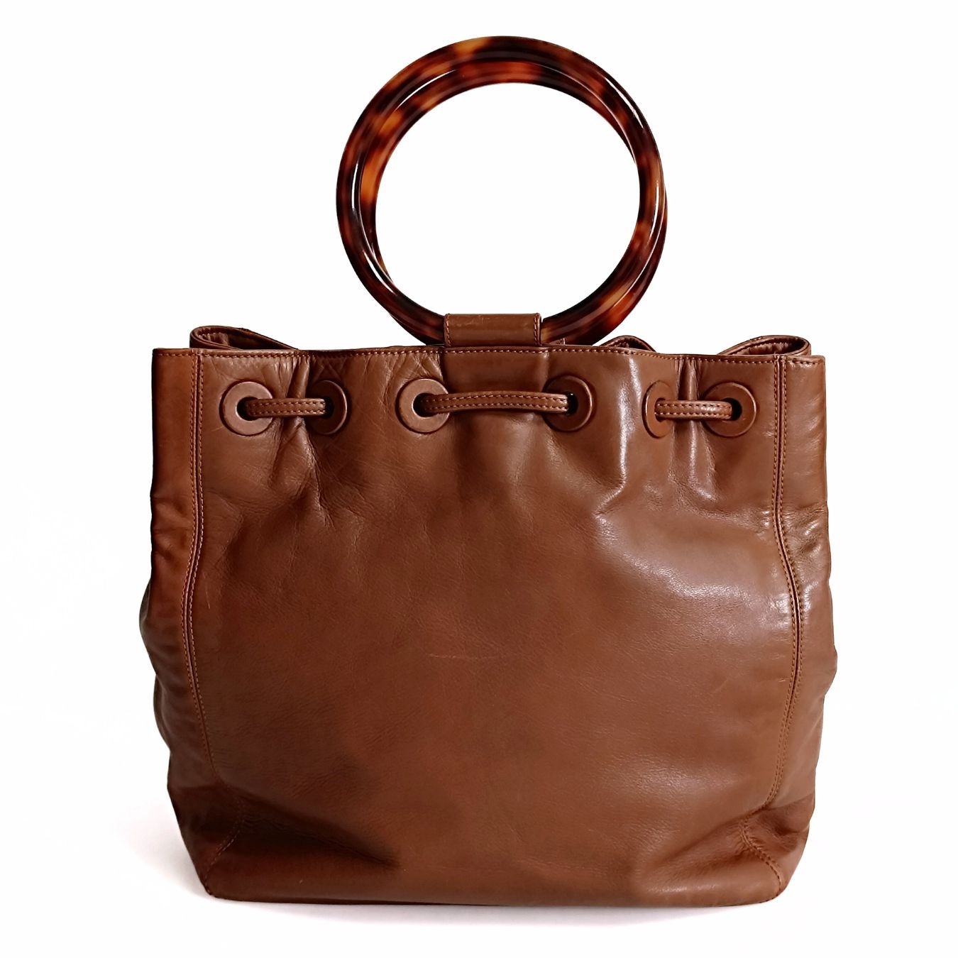 CHANEL bucket style handbag with drawstring in leather and bone