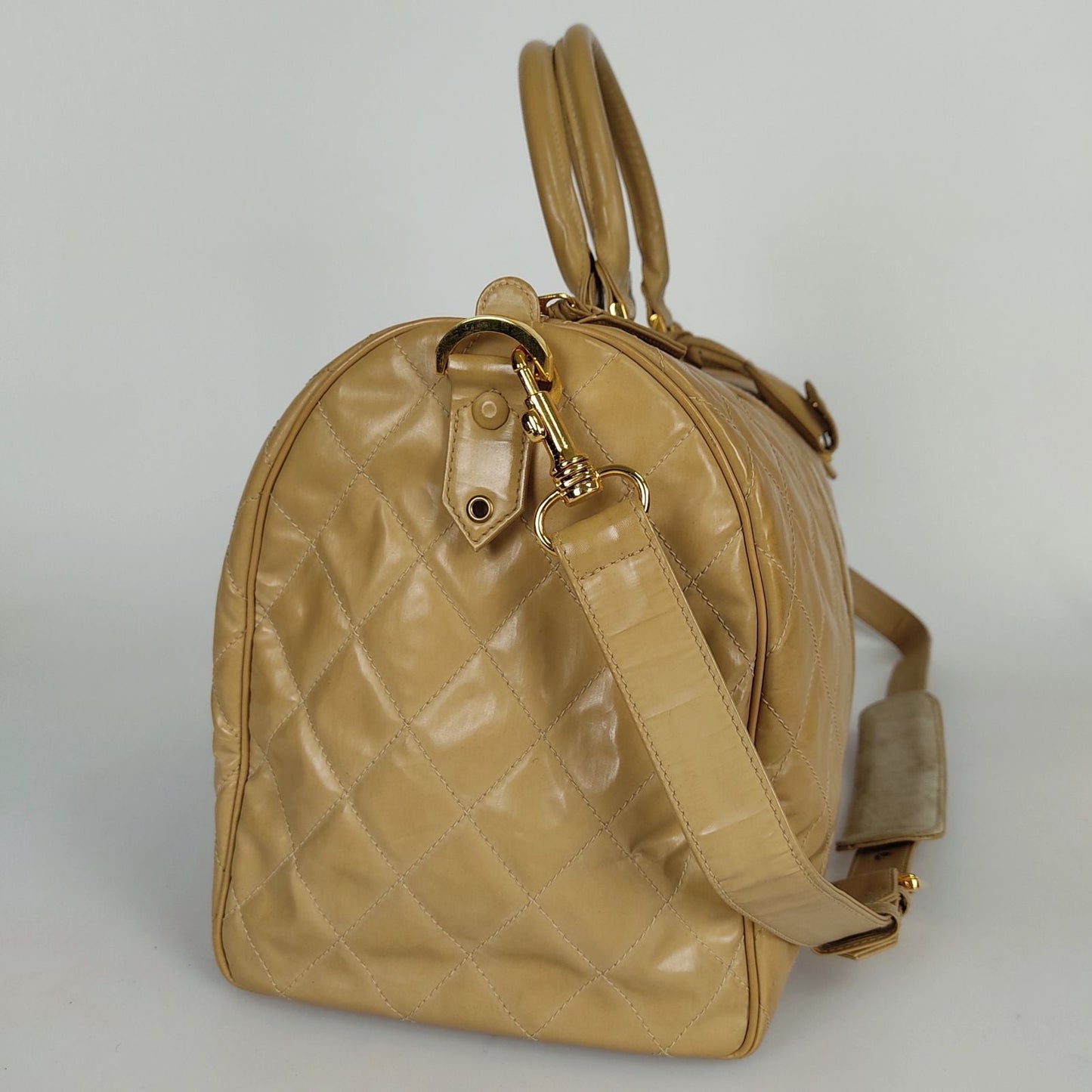 Chanel Chanel Chanel quilted travel bag in beige patent leather