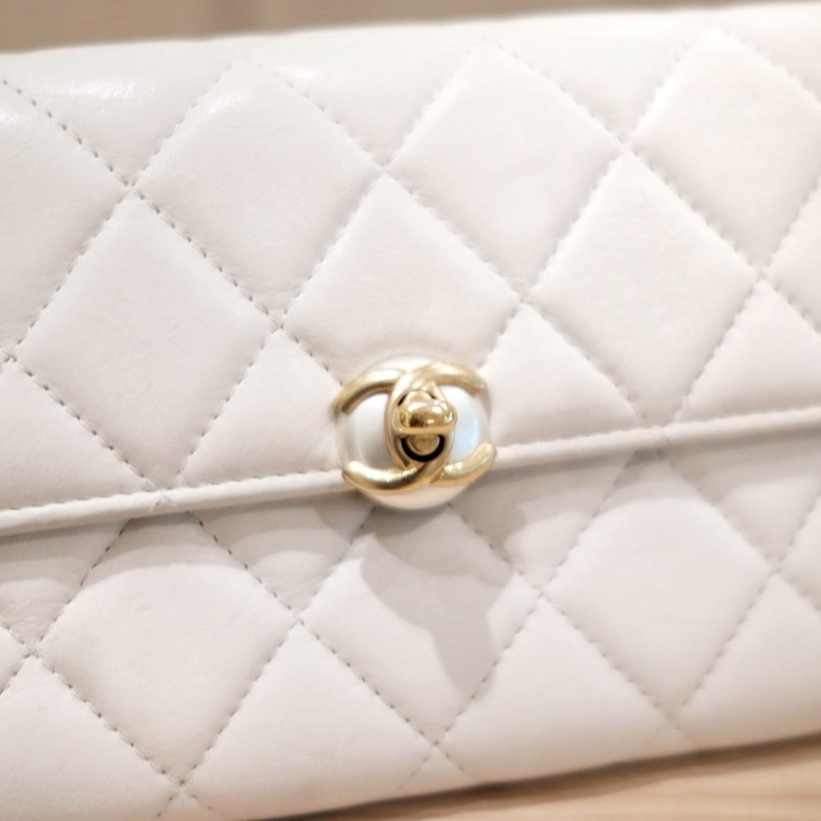 Chanel lambskin pearl CC long wallet
