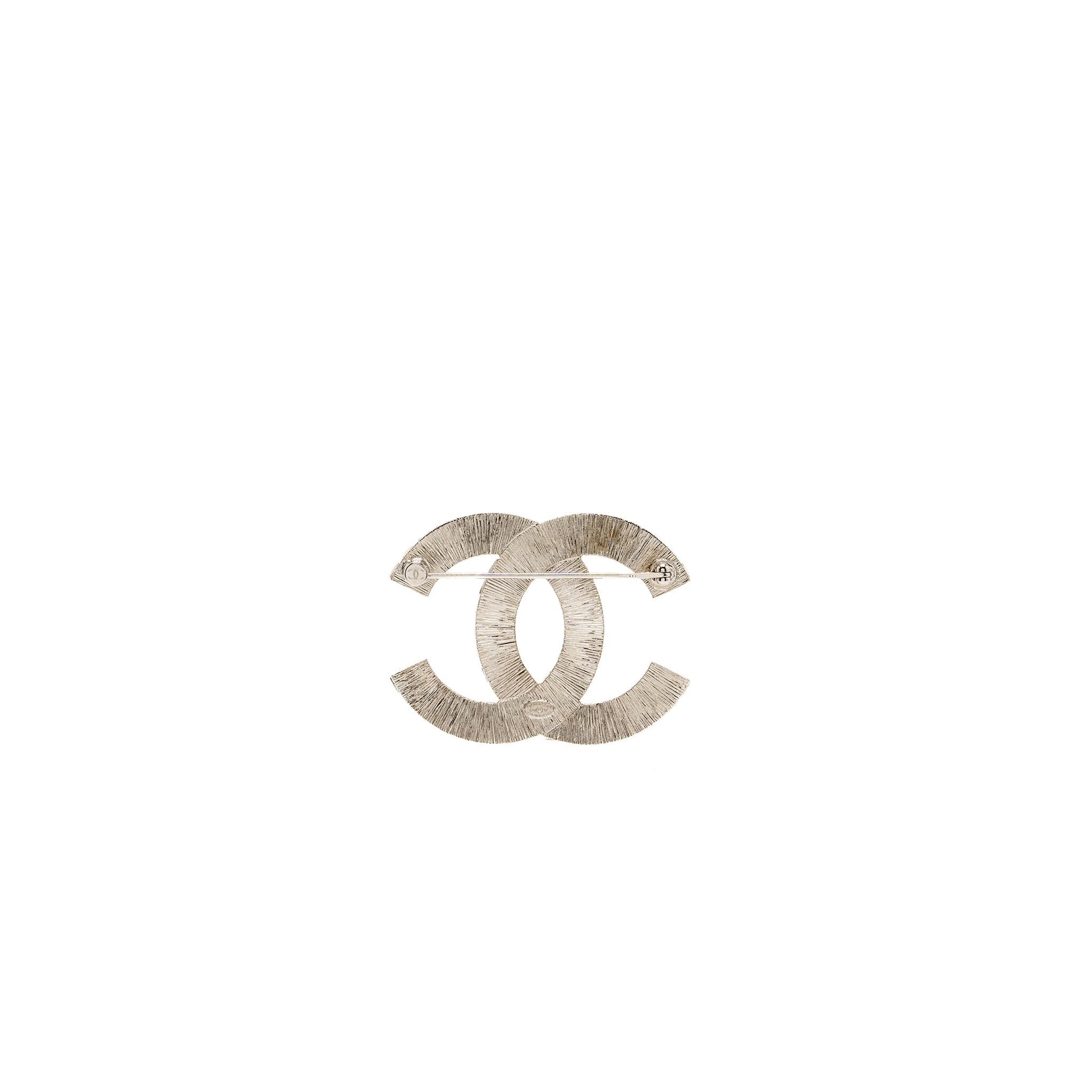 Chanel cc logo brooch crystal tone Silver Handbag