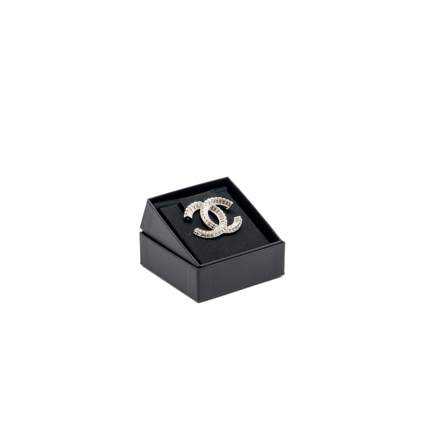 Chanel cc logo brooch crystal tone Silver Handbag
