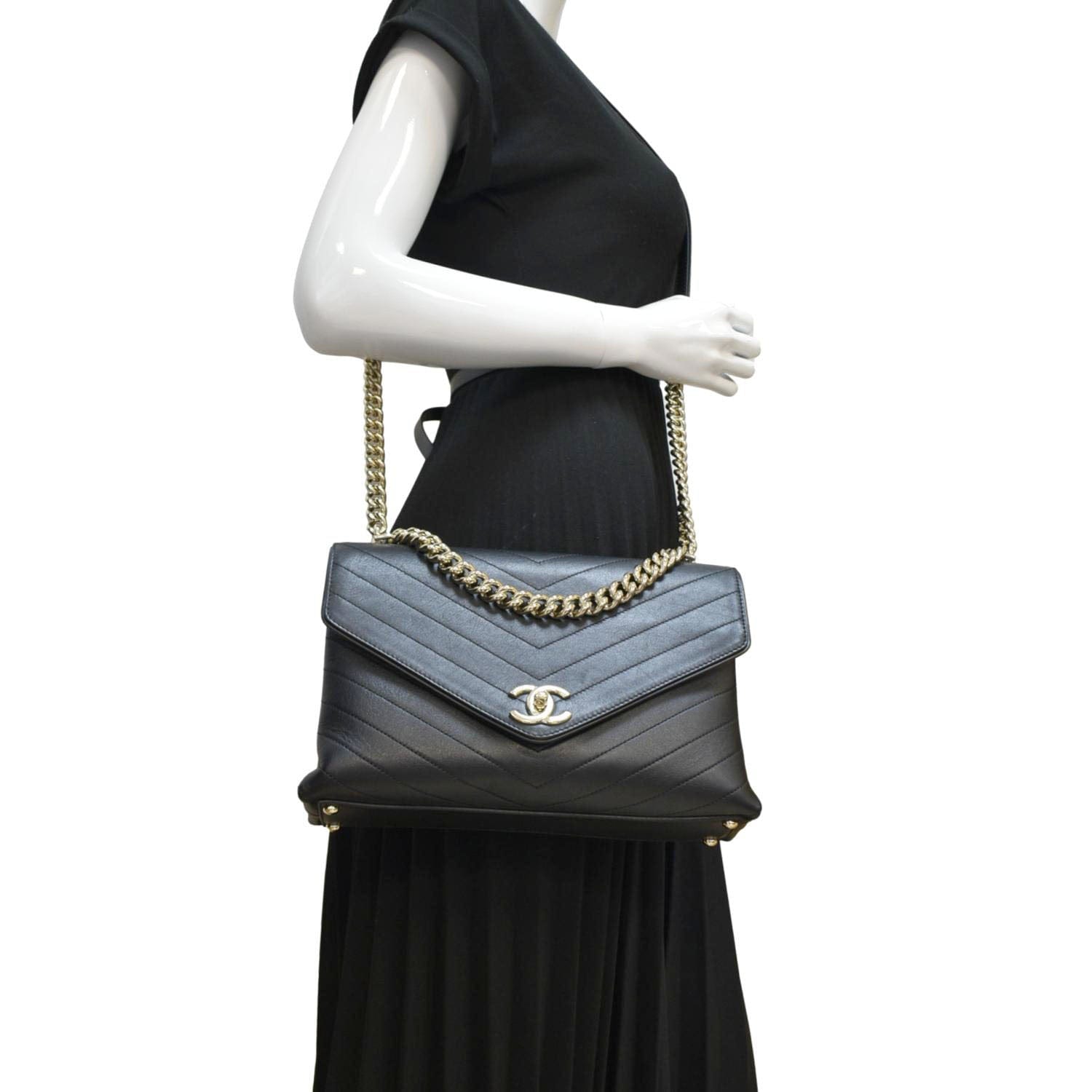 Chanel Coco Flap Chevron Stitched Leather Black Travel Bag