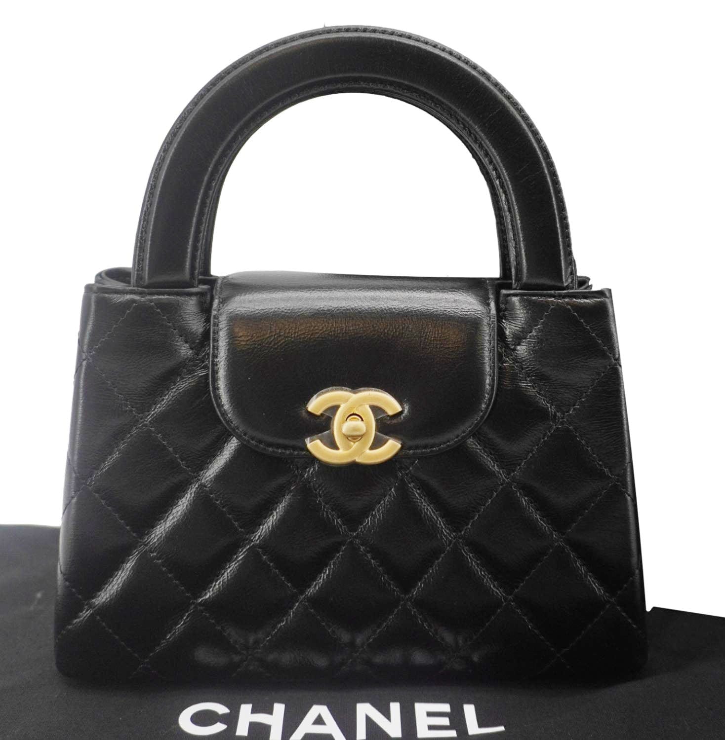 Chanel Kelly Quilted Aged Top Handle Leather Calfskin Black Nano Travel Bag