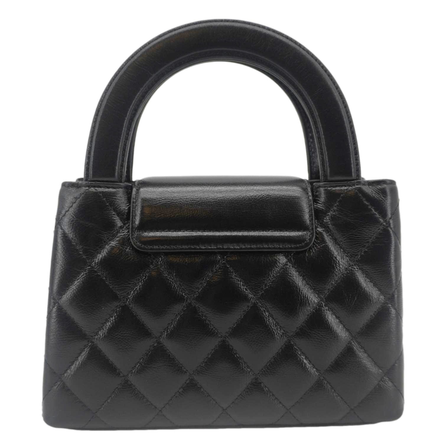 Chanel Kelly Quilted Aged Top Handle Leather Calfskin Black Nano Travel Bag