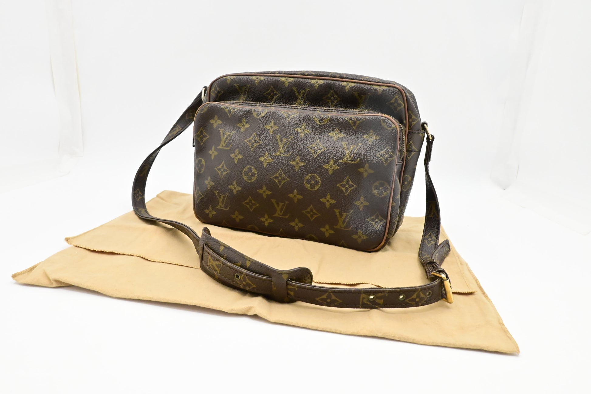 Louis Vuitton Nile PM Monogram Canvas Handbag