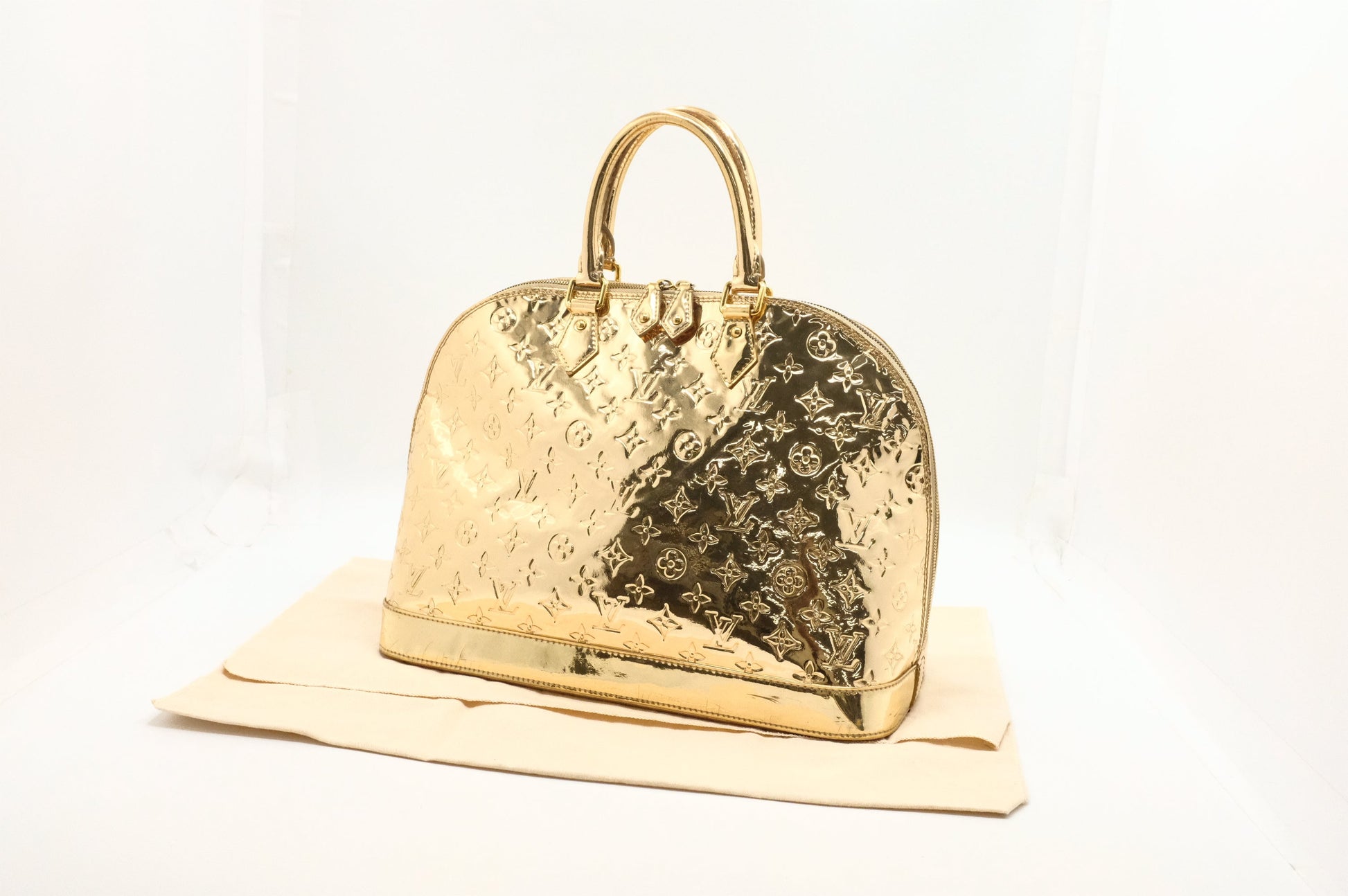Louis Vuitton Alma GM Vernis Leather Gold Handbag