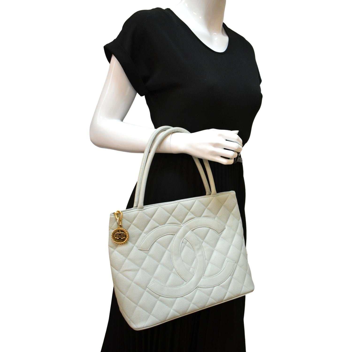 Chanel Medallion Quilted Caviar Leather White Travel Bag