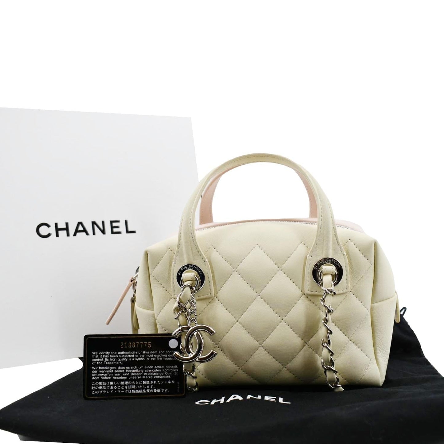 Chanel Feather Weight Quilted Bowling Calfskin Ivory Travel Bag