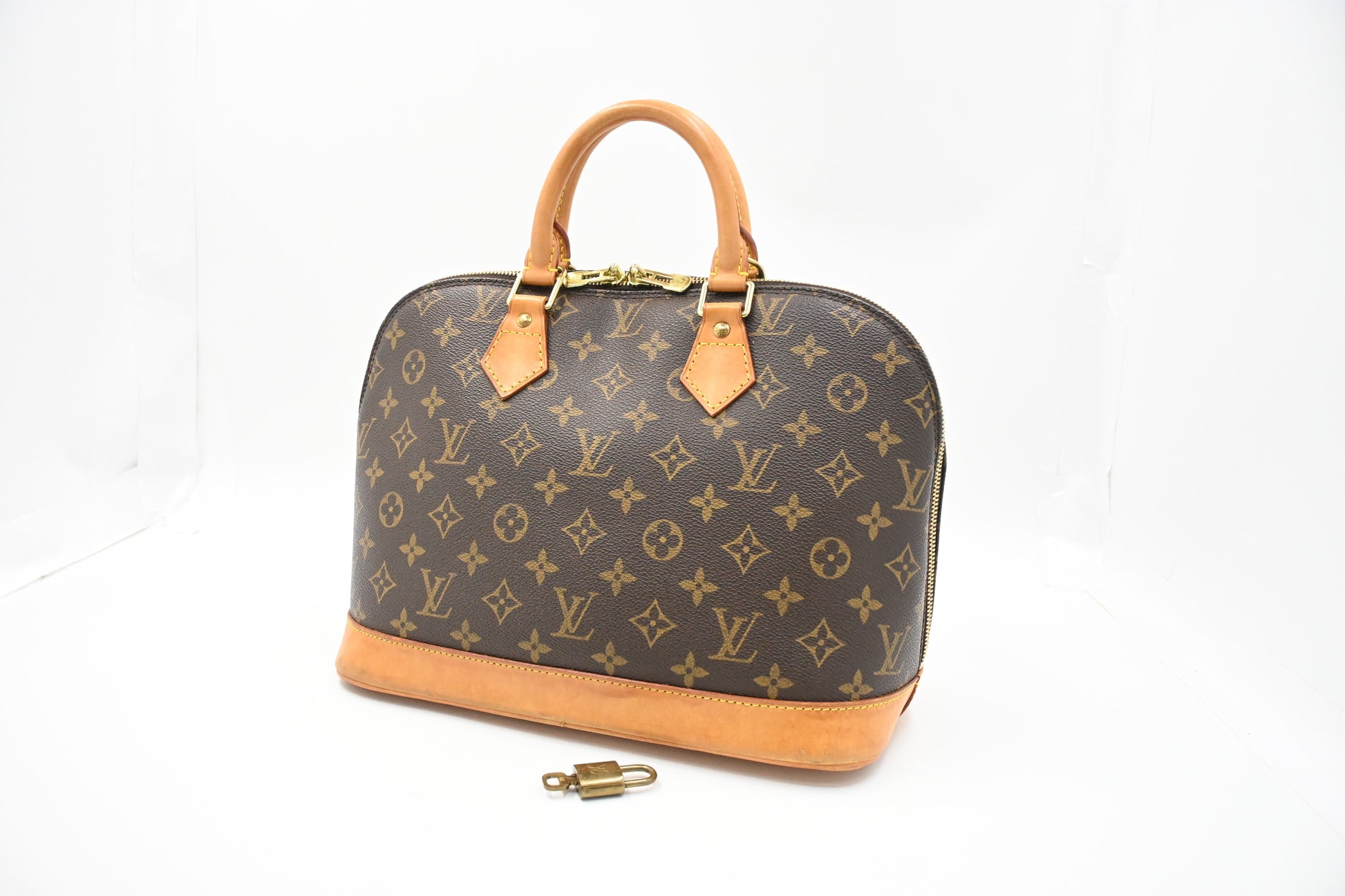 Louis Vuitton Alma PM Monogram Canvas Handbag Canvas 4
