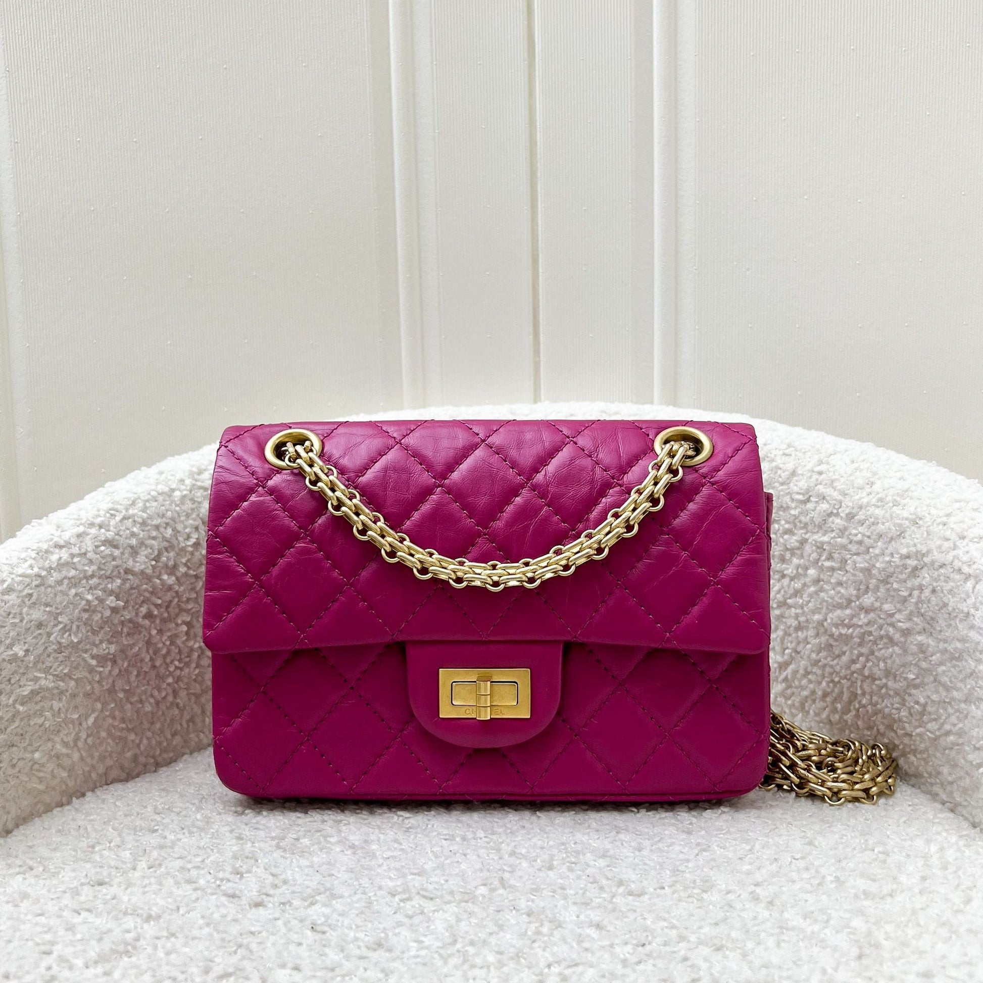Chanel Classic 2.55 Reissue Mini Flap in Pink Distressed Calfskin and Aghw Handbag