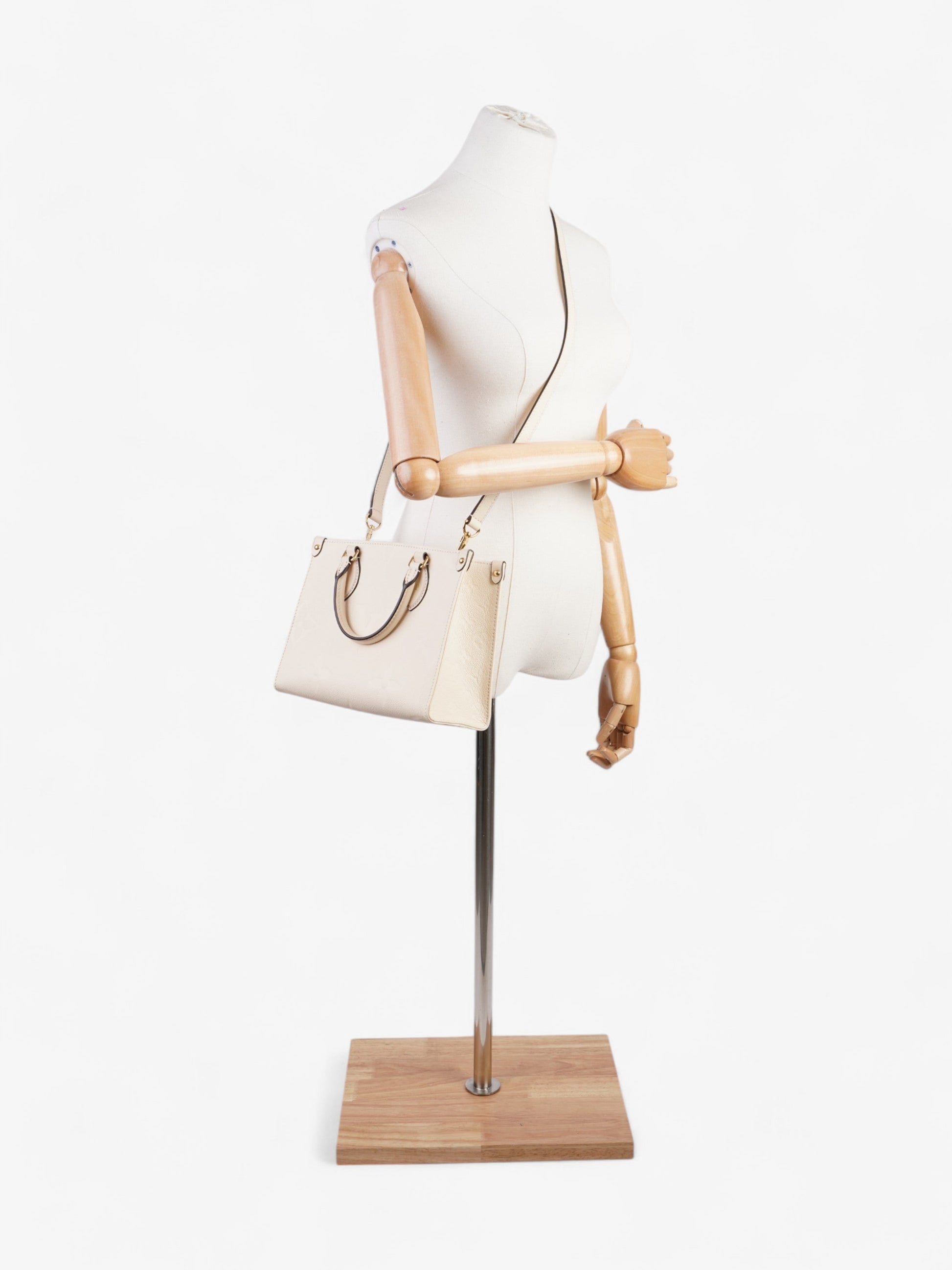 Louis Vuitton On Go Creme PM Empreinte Leather On The Go Handbag