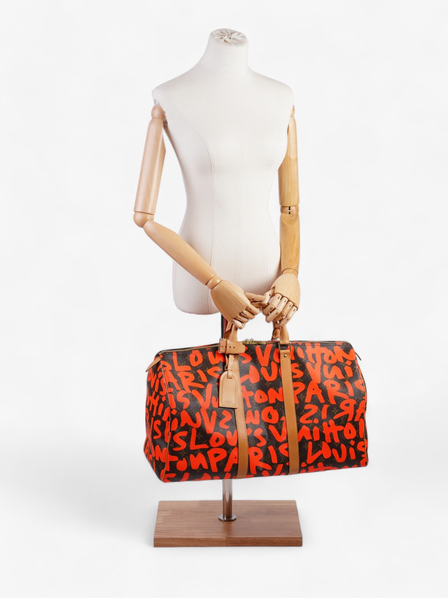 Louis Vuitton Keepall Graffiti 50 Coated Monogram Canvas Coated Canvas Orange Apparel