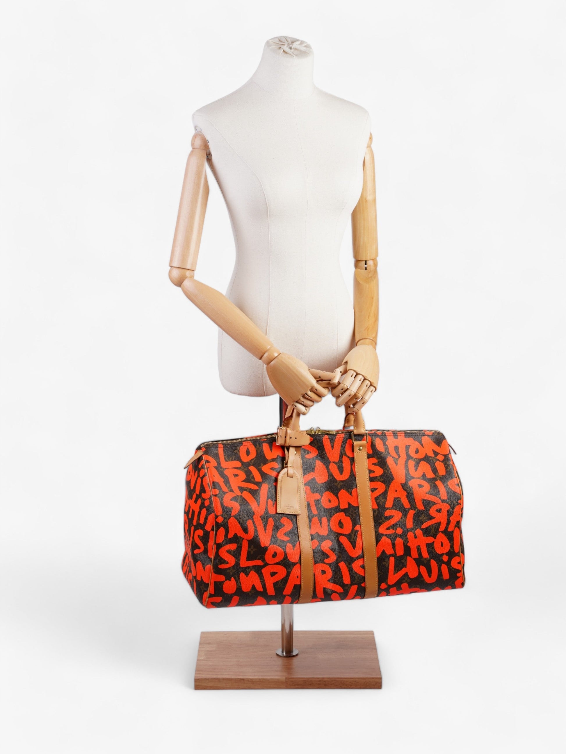 Louis Vuitton Keepall Graffiti 50 Coated Monogram Canvas Coated Canvas Orange Apparel