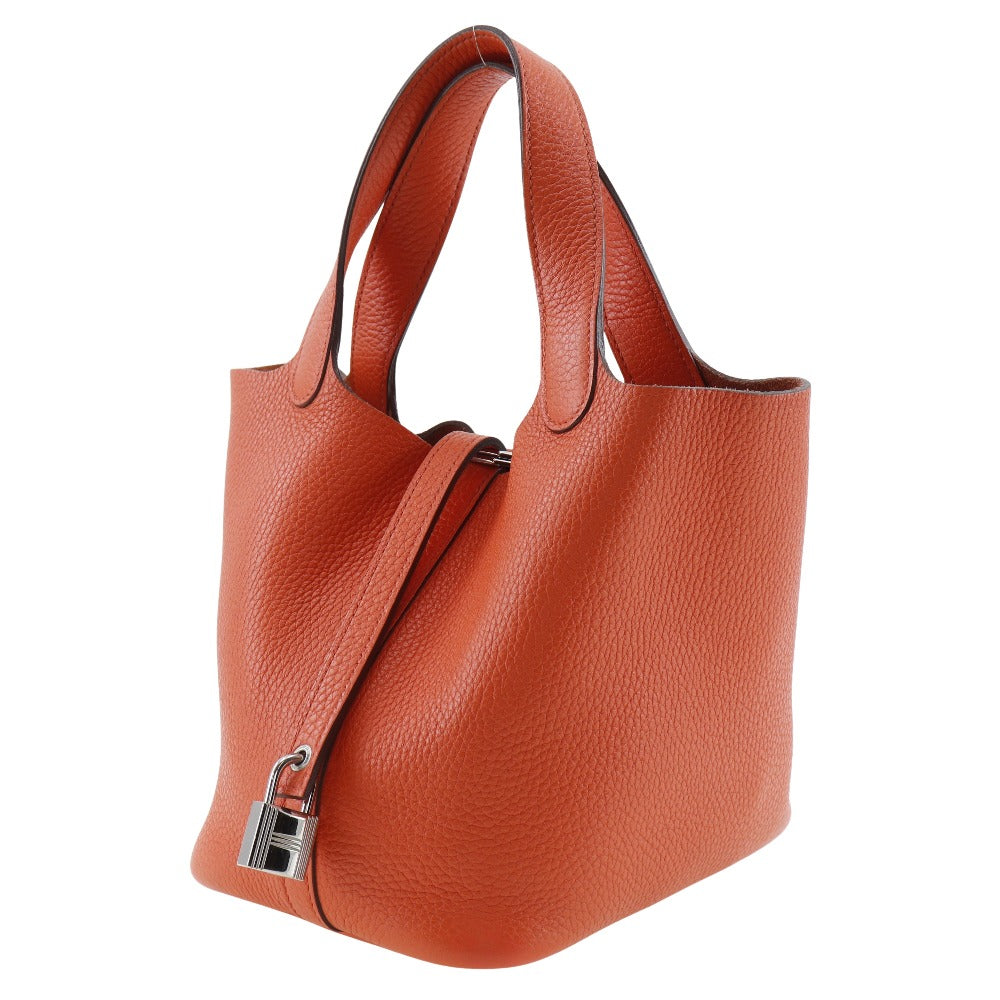 Taurillon Clemence Orange Metal Picotan Lock Pm Silver Travel Bag