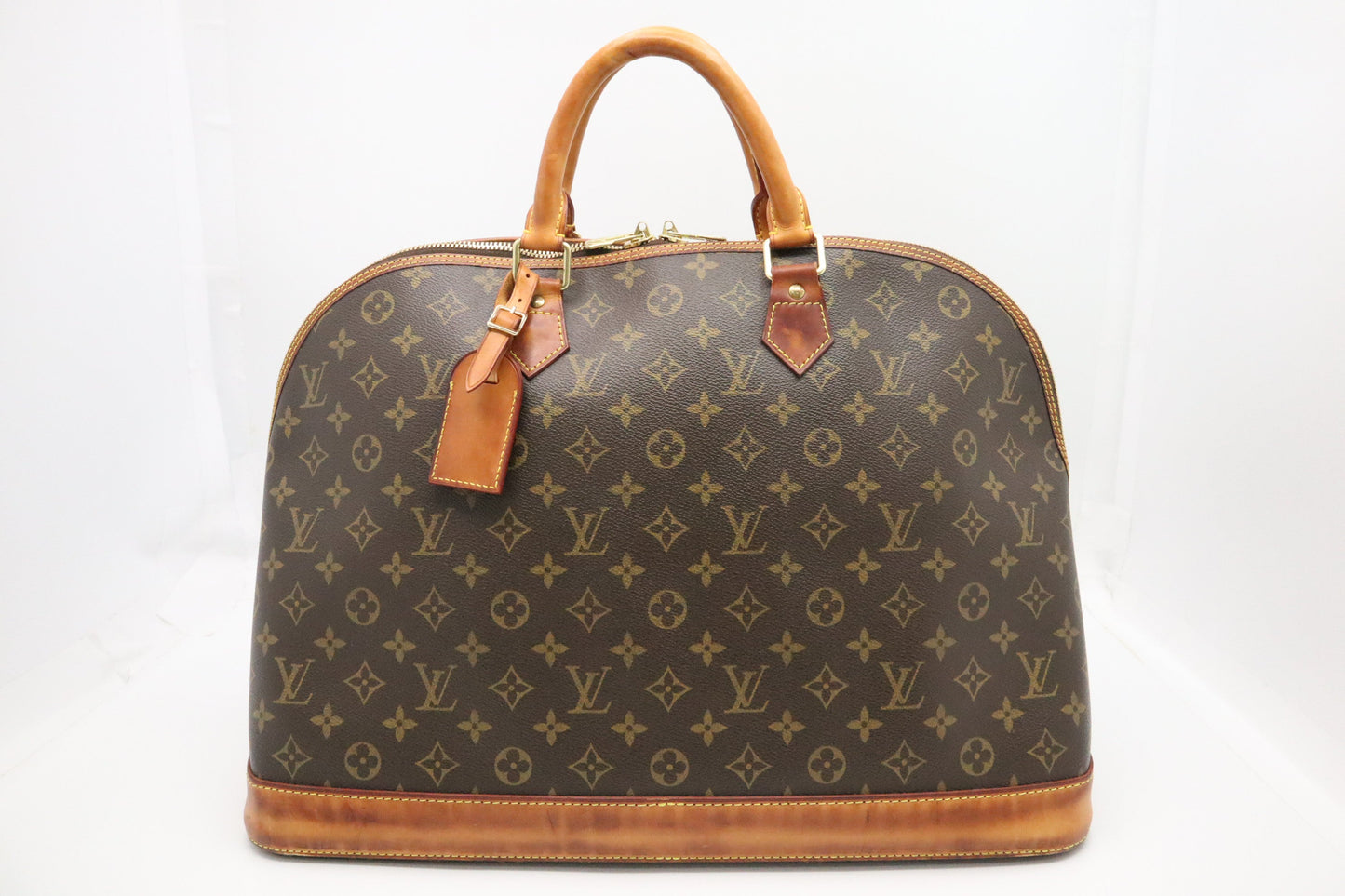 Louis Vuitton Alma Voyage GM Monogram Canvas Handbag