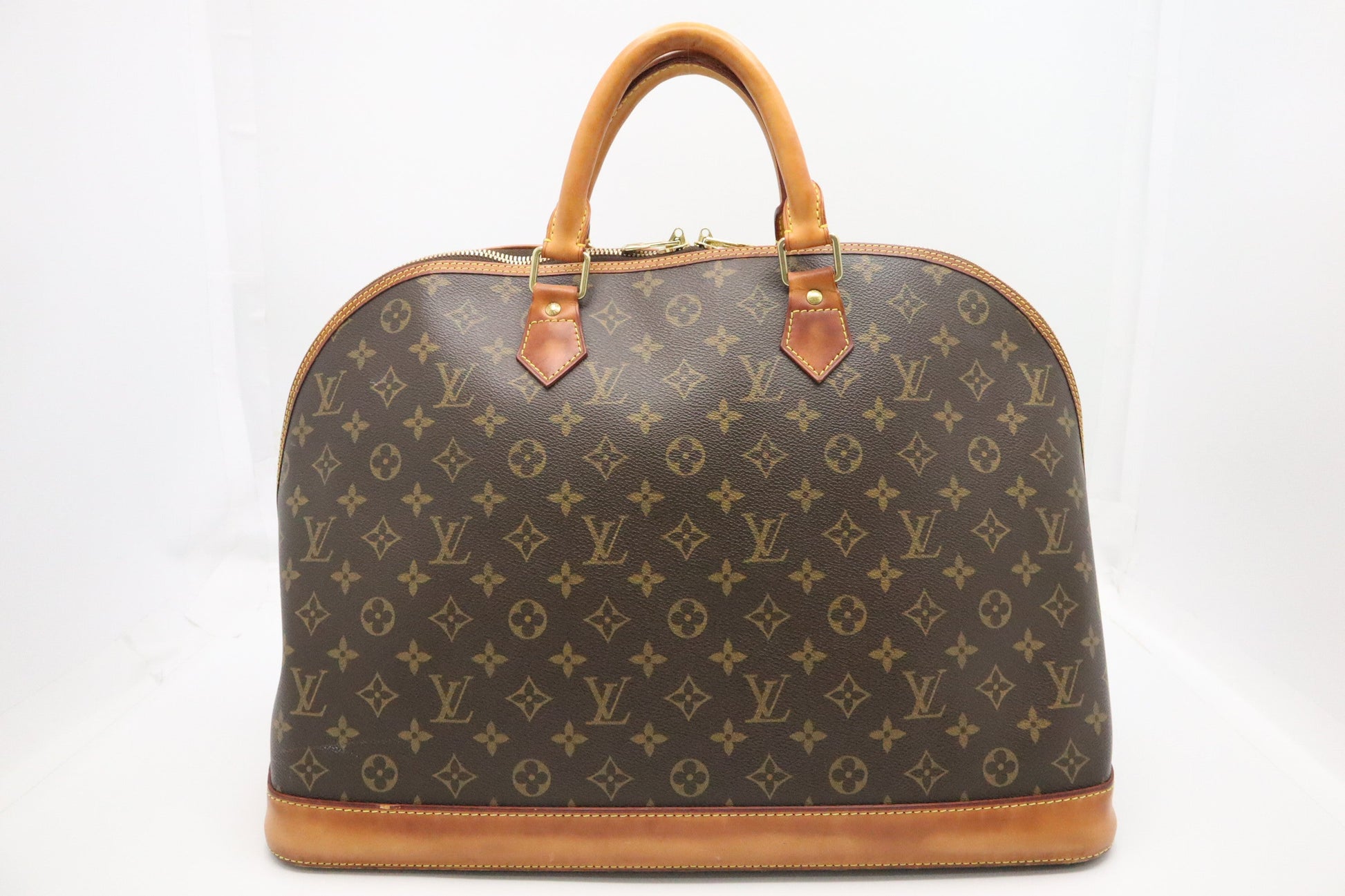 Louis Vuitton Alma Voyage GM Monogram Canvas Handbag