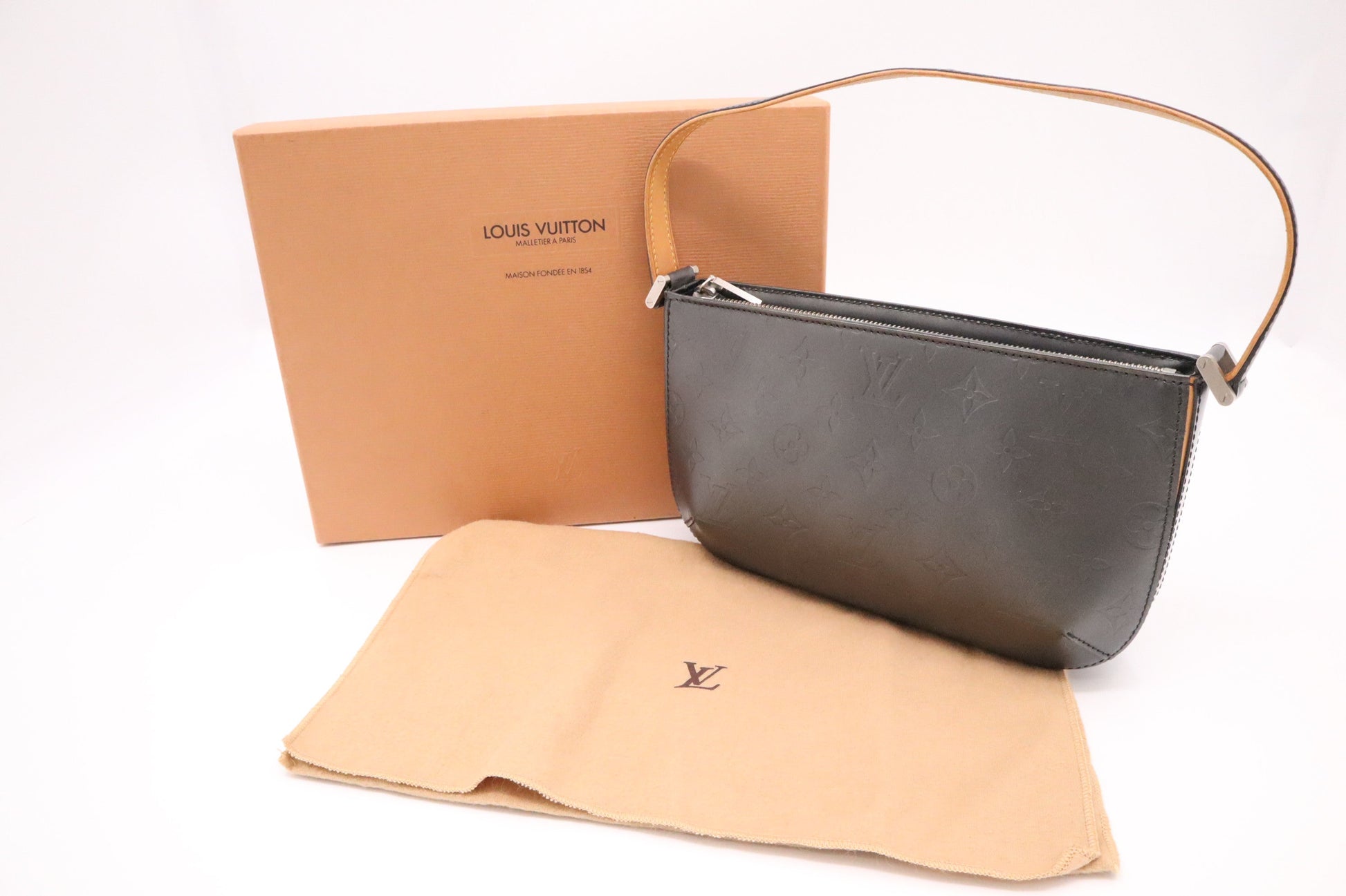 Louis Vuitton Fowler Dark Leather Handbag