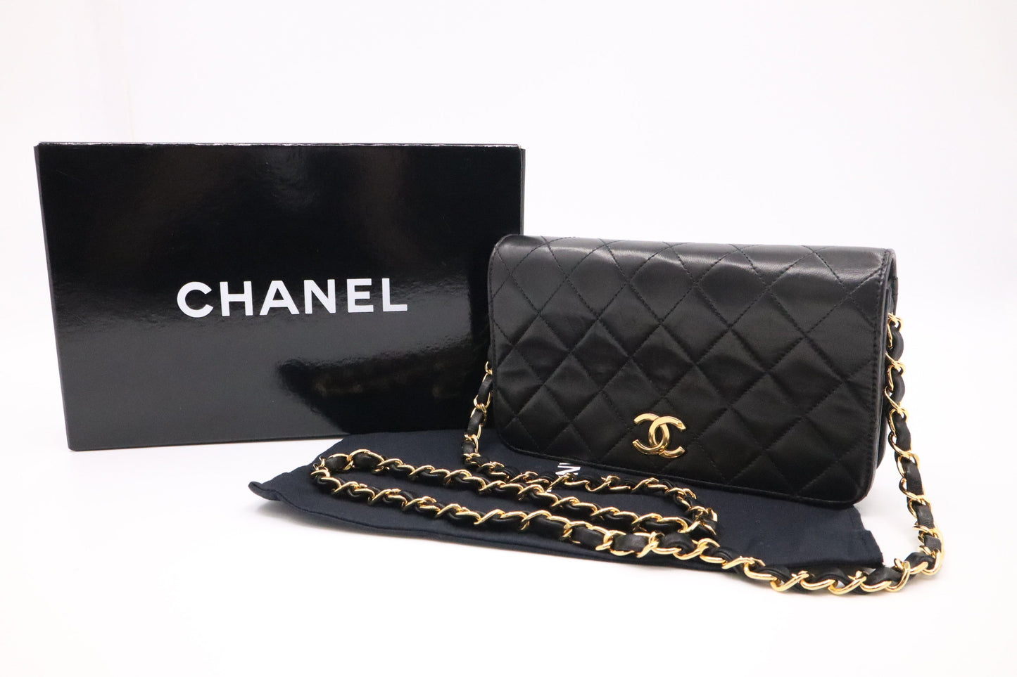 Chanel Full Flap MattelassÃ© Black Leather Mini Bag