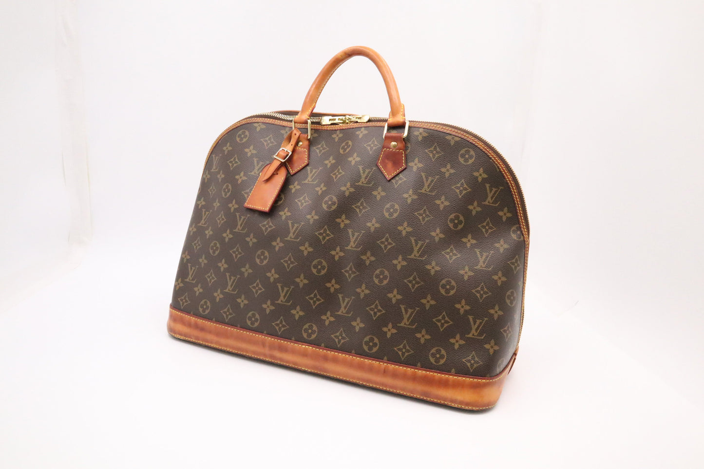 Louis Vuitton Alma Voyage GM Monogram Canvas Handbag