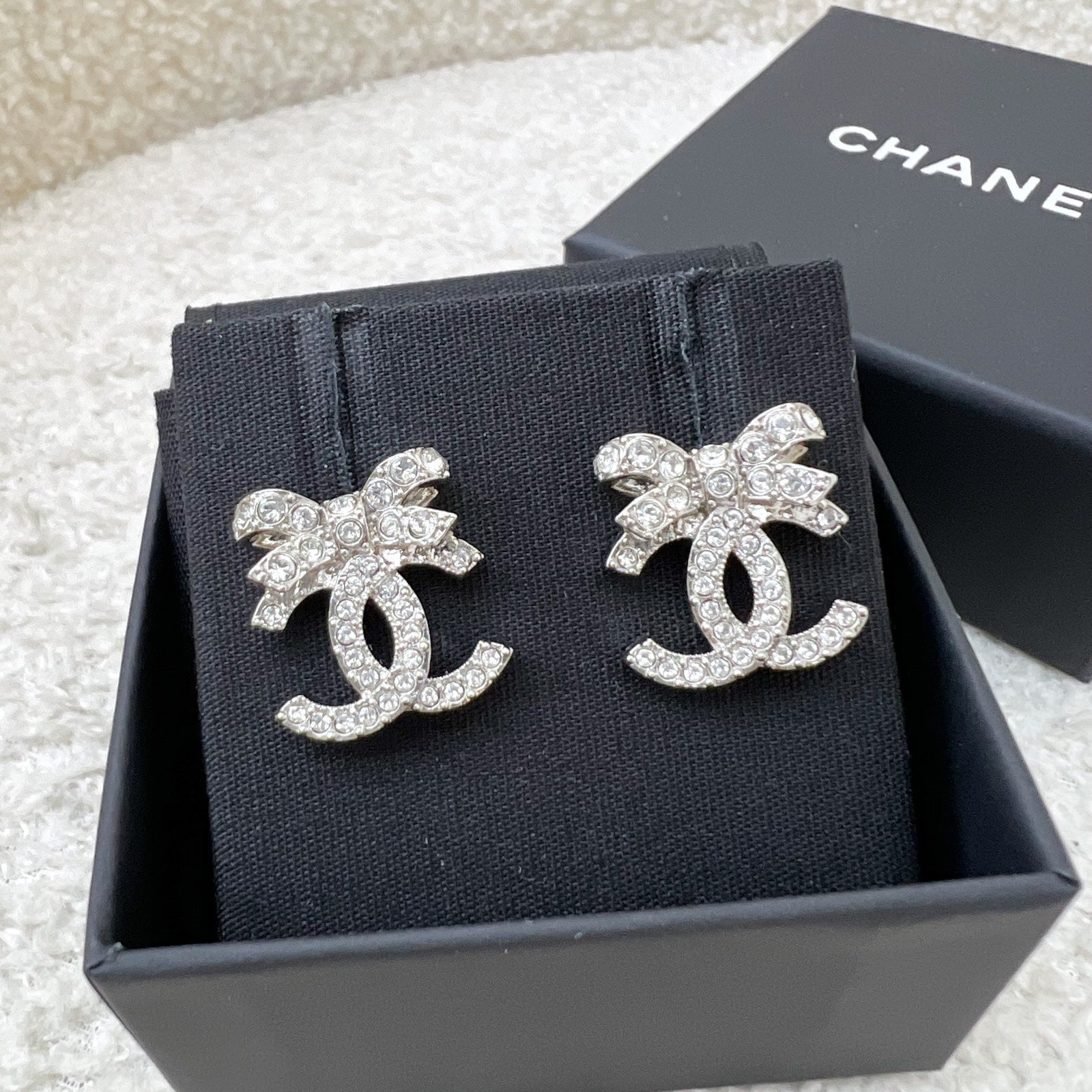 Chanel 23S Ribbon Earrings with Crystals in Shw